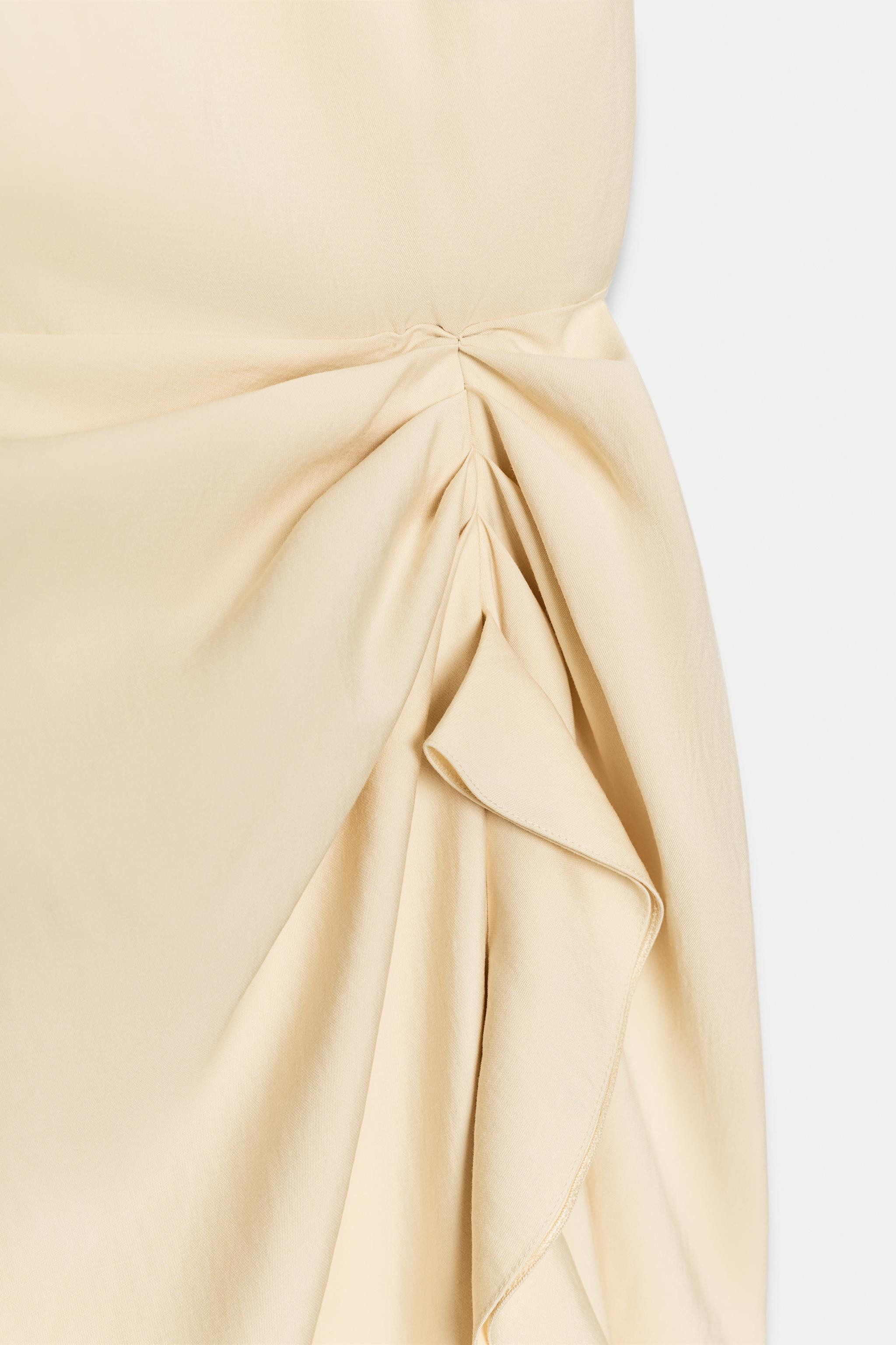 ZARA WOMAN COLLECTIONMidi dress made from a viscose blend yarn. Round neck and dropped armholes. ... | Zara UK