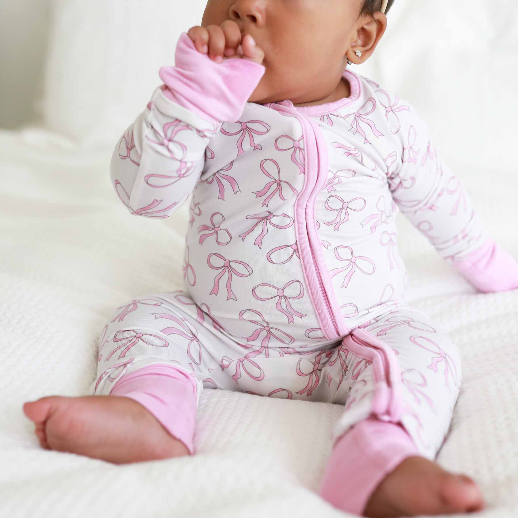 Blushing Bows Convertible Zip Romper | Caden Lane