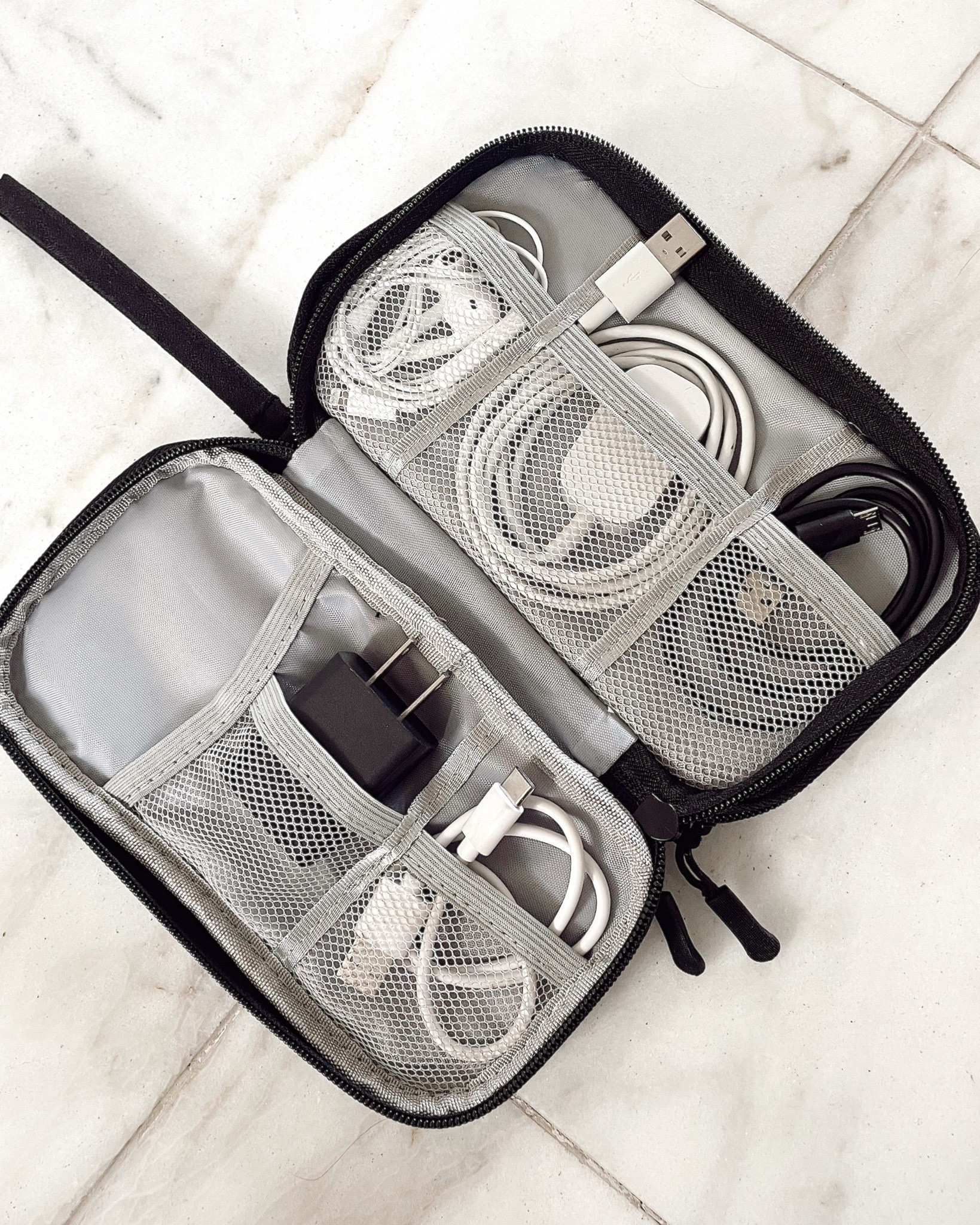 Travel must haves - cord organizer from Amazon! Keeps all your cords neat and organized! Also hood a portable charger.



#LTKSaleAlert #LTKFindsUnder50 #LTKTravel