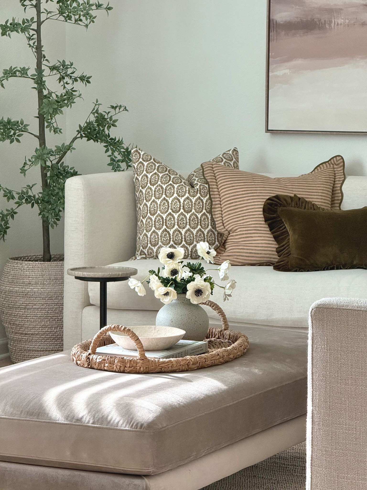 Capturing the light, and still loving my cozy new sofa pillows.

Coffee table decor, living room decor, home decor, basket tray, best faux florals, scalloped pillows, black olive tree, Lulu and Georgia, 

#LTKSeasonal #LTKHome #LTKSaleAlert