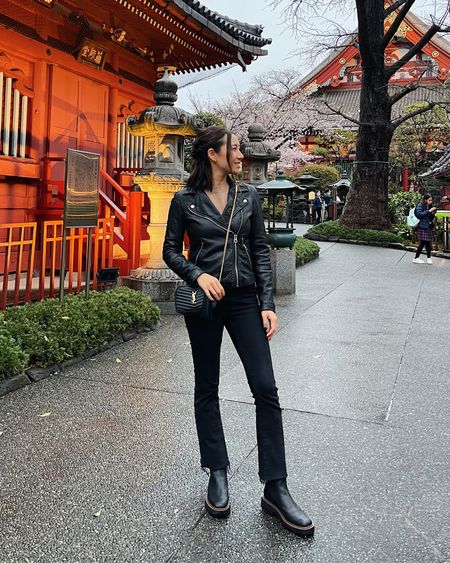 Japan travel outfit 

- moto jacket, black jeans, purse, boots, edgy outfit 

#LTKstyletip #LTKtravel