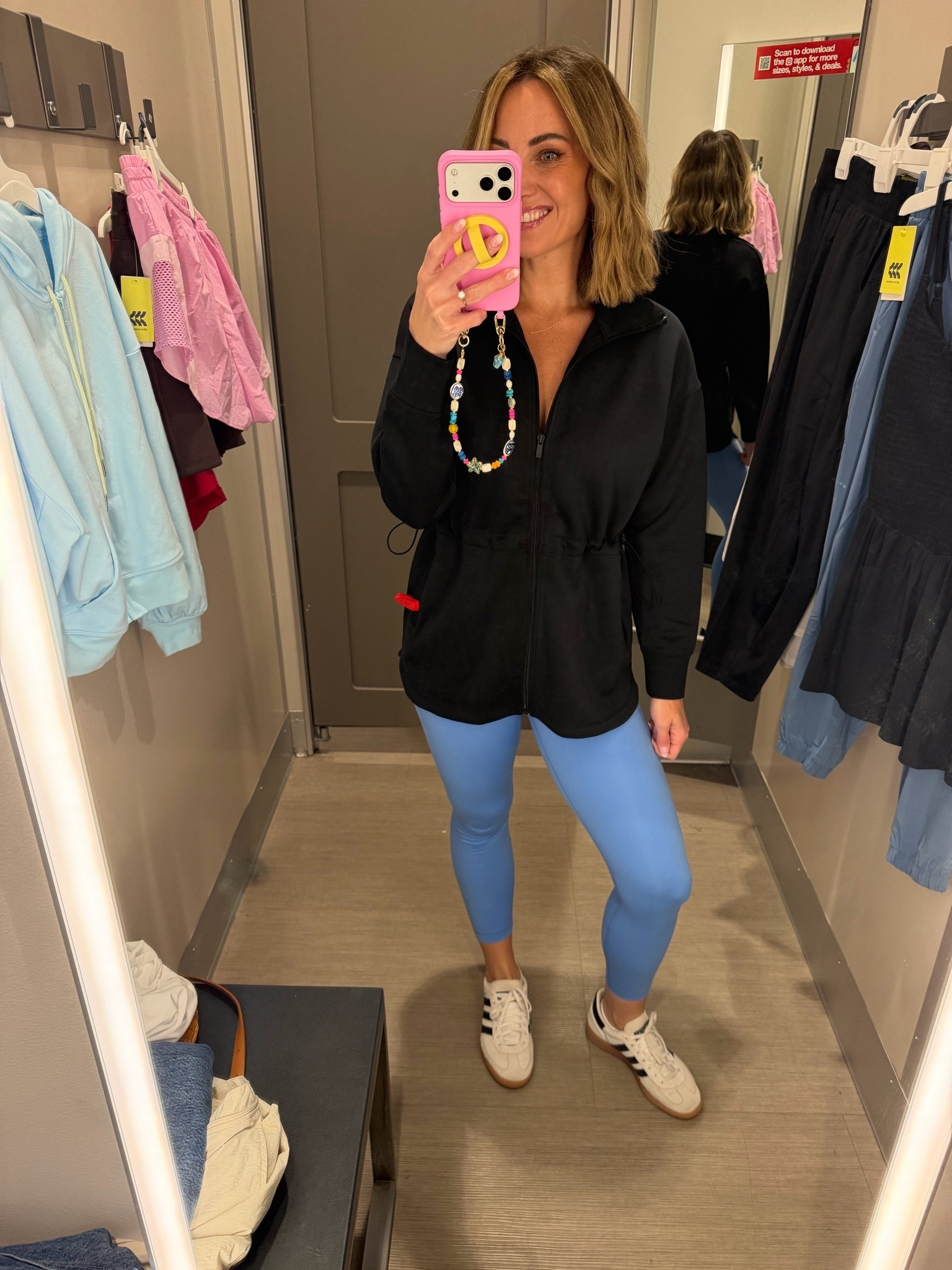 LOVE the booty coverage of this zip up for leggings. In a small.