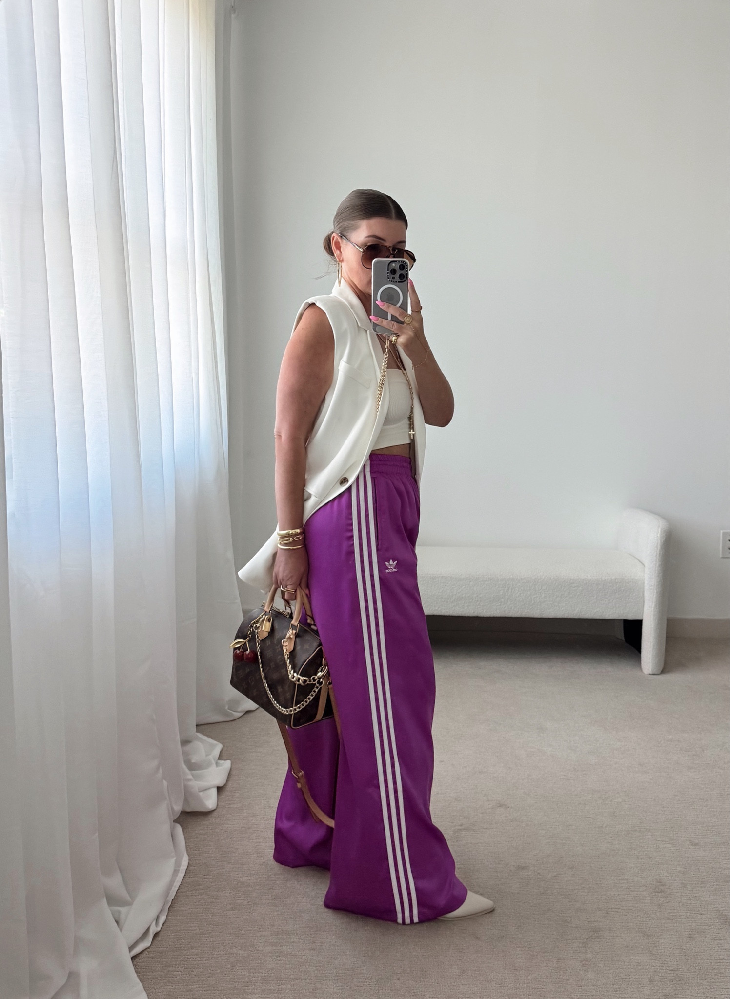 Adidas satin wide leg track pants fit tts (sizes are oddly stocked, get a size up or down if your size is missing)

I’m an 8 and went with a size up. They’re SUPER long. I wore 4” heels here and they still dragged the ground.

I love them so much I’m going to have them hemmed to fit 



#LTKFindsUnder100 #LTKStyleTip