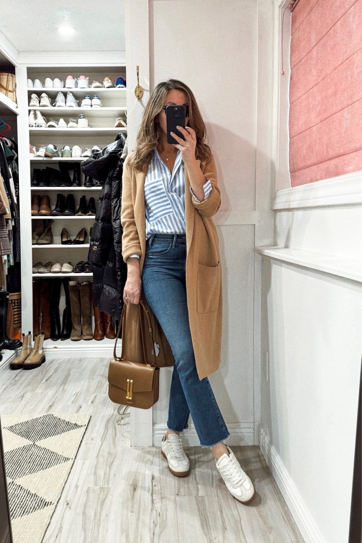 The wildest February yet - it’s 58° 😳🙌🏼. Bringing out my favorites.
Mother jeans tts. Linking a similar style for less. 
Ayr stripe button down in xs - the fit is slightly oversized. Linked great alternatives for less  
Sneakers 👟 tts and probably my faves since I bought them last summer.  
Coatigan from J Crew no longer available but linked almost identical options  
Bag comes in ton of colors. Mine is in toffee. Can be worn three different ways. 

#LTKshoecrush #LTKstyletip #LTKover40