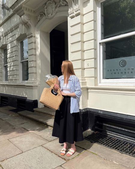 Blue Stripe Shirt, White Vest, Summer Shirt, Linen Shirt, Black Skirt, Midi Skirt, Summer Skirt, Picnic Outfit, Festival Outfit, Basket Bag, Straw Bag. 🧺

#LTKfindsunder100 #LTKSeasonal #LTKfindsunder50