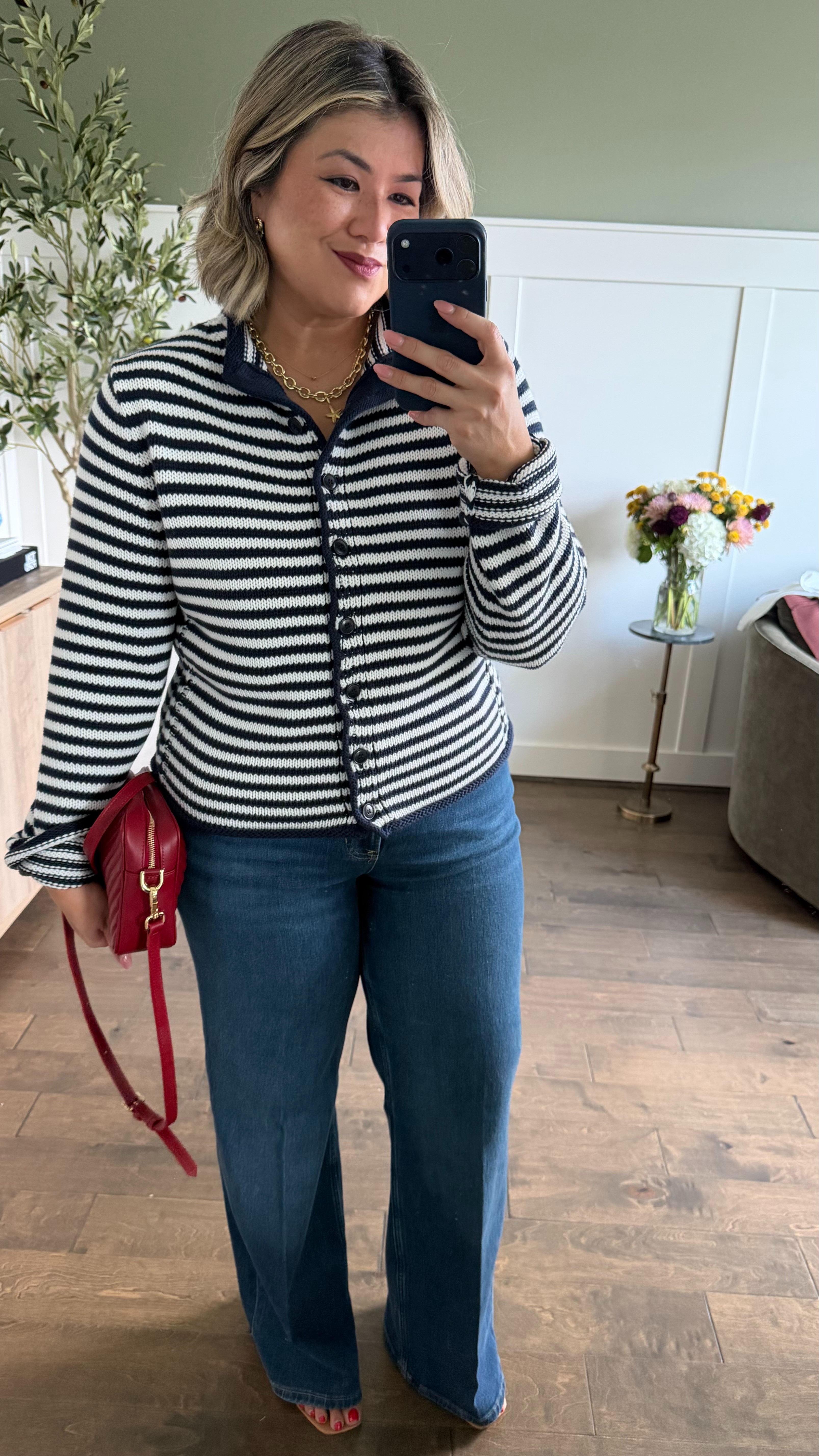 I'm wearing an XL in the reversible roll neck cardigan. This piece runs slightly smaller than the traditional roll neck sweaters (I wear a medium in the regular roll neck, a large in the quarter zip tiny roll neck). I recommend sizing up one.

My typical size in all Authentic 360 jeans is an XL, petite. I initially ordered these in that exact size, however, I decided to re-order a 1X (regular inseam). While they fit a bit more loose, I much prefer comfort over the label in my pants. These jeans just happened to run a bit smaller than the others, but that’s what I’m here for—to test it out and let you know exactly how they fit so you can make the best decision for yourself when ordering! 

Use code CMCLAIREXSPANX for 15% off your first purchase + free shipping, excluding sales. ￼ 

 #LTKootd #LTKOver40 #LTKMidsize