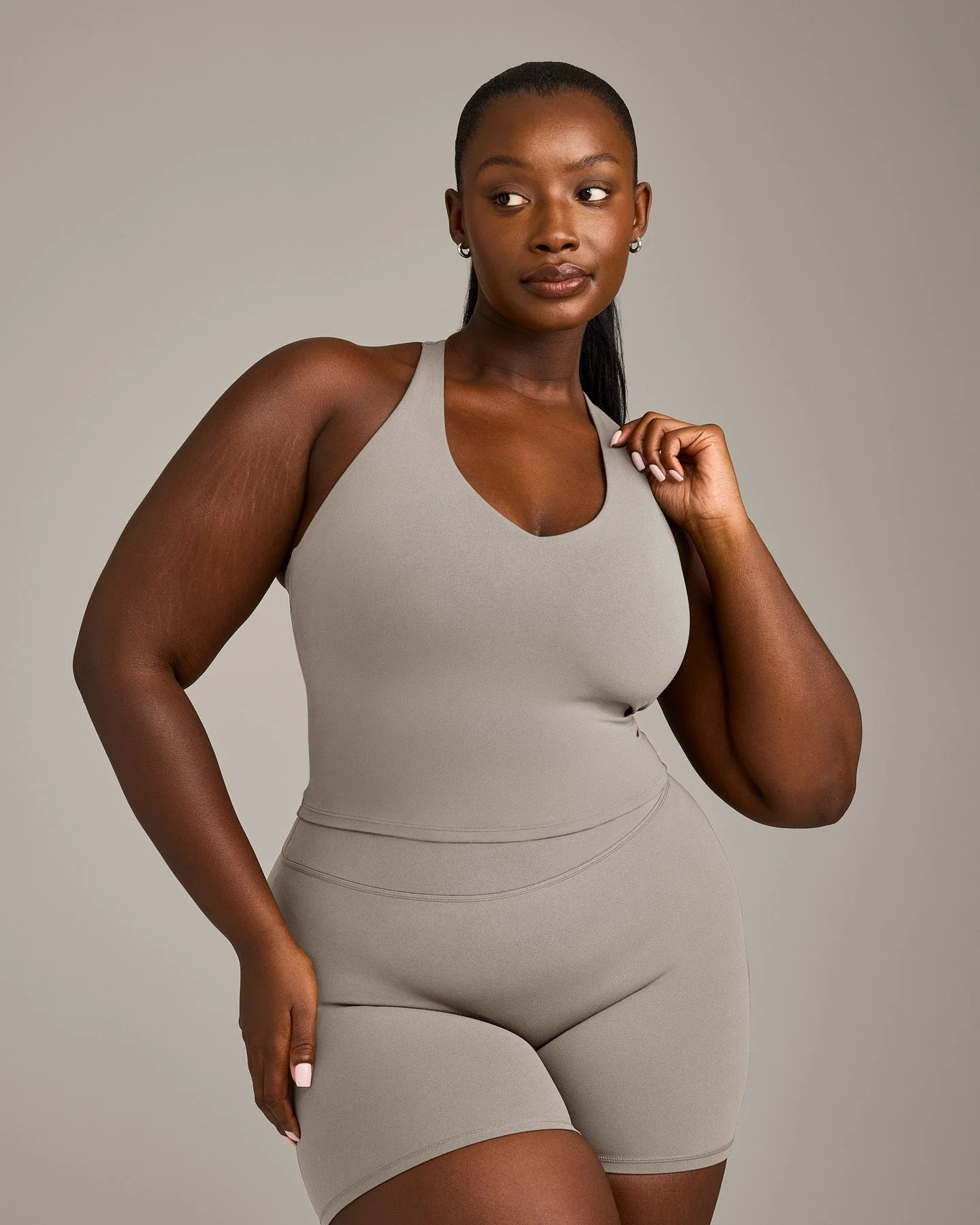 SoftMotion™ Racer Back Mid Vest with Built in Bra Shelf with White Logo 
 Warm Sand | Oner Active (UK / US)