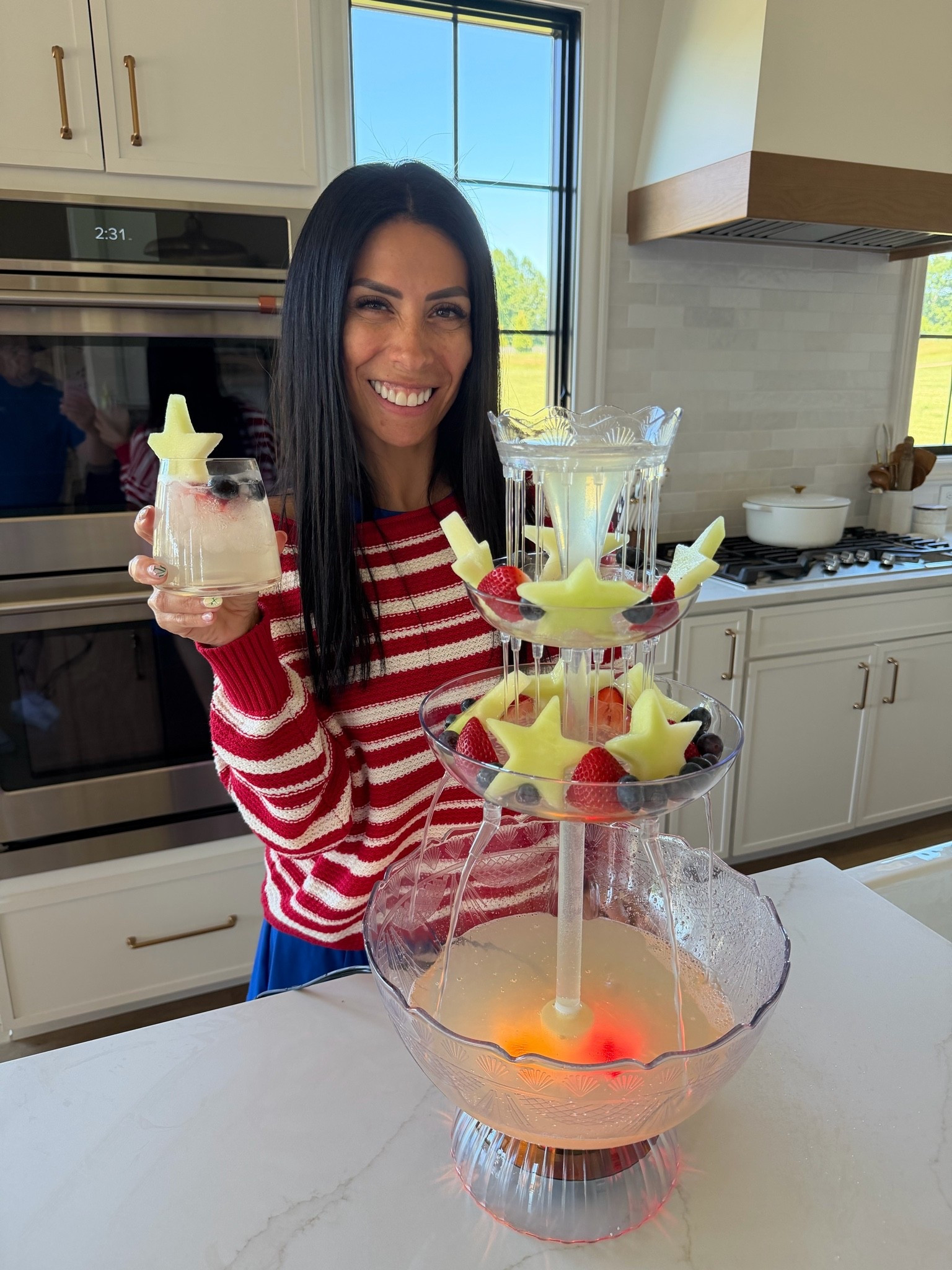 MEMORIAL DAY LEMONADE SANGRIA 🇺🇸
• 1 bottle white wine (Pinot Grigio, Sauvignon Blanc or Moscato)
• 3 cups lemonade
• ½ cup Grand Marnier, Triple Sec or peach schnapps
• 2 cans lemon sparkling soda or San Pellegrino Limonata
• Strawberries, halved
• Blueberries
• Apples or honeydew melon cut into stars
• Ice
Add wine, lemonade and liqueur to the bottom of this beverage fountain. Add fruit to the second and top tier. Add lemon soda before serving. Serve over ice and garnish with extra fruit.
If you want to make this in advance, you totally can and just keep it in the fridge cold until serving! ⭐️🫐🍓

#LTKmomlife #LTKSeasonal #LTKfoodie