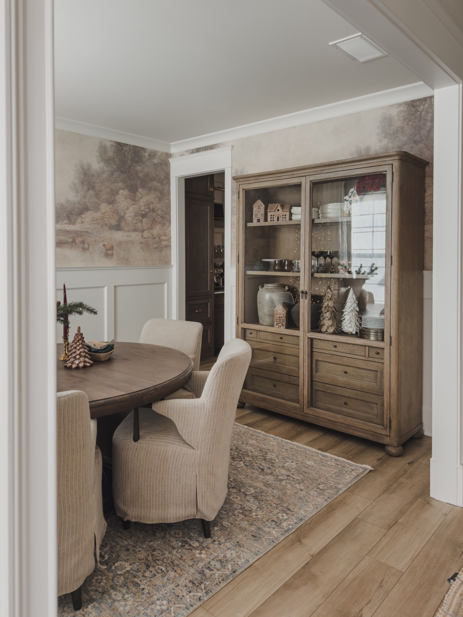 Dining room reveal with my much anticipated mural! Loving this collected style with a touch of vintage style for a timeless look.

Home finds, neutral home inspo, dining room details, collected style, dining table details, dining hutch, neutral wood tones, vintage style details, upholstered dining chair, vintage style area rug, rich wood tones, holiday home inspo, Four Hands, Loloi, Pottery Barn style, Target style, found it on Amazon, shop the look!

#LTKHoliday #LTKSeasonal #LTKHome