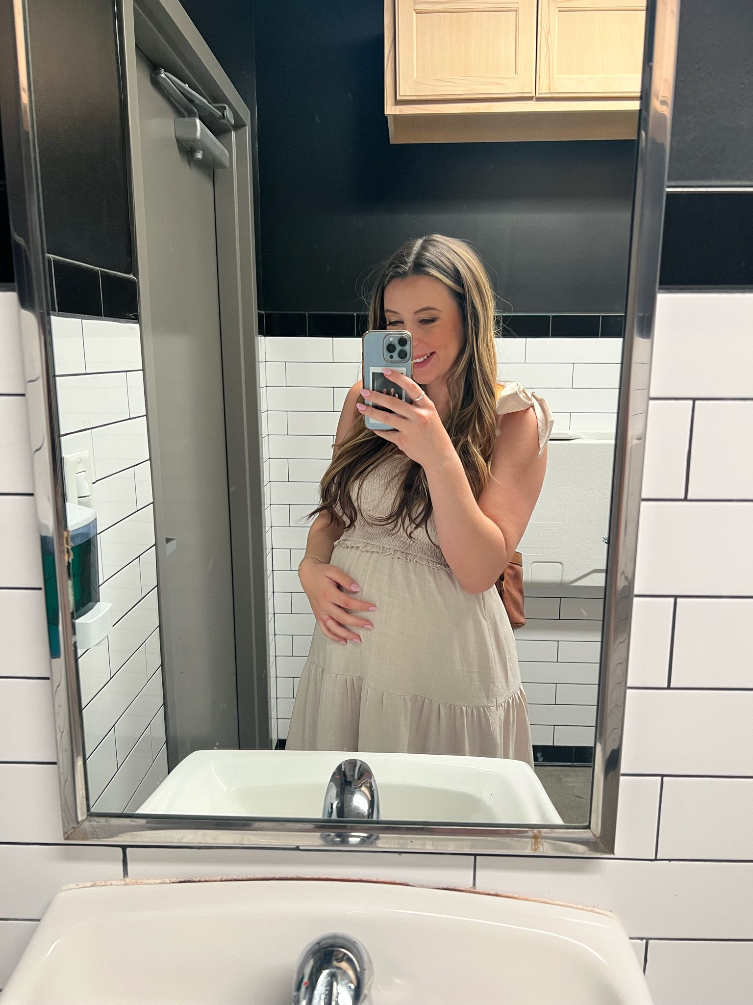 Perfect beige bow strapped tier maternity dress for baby shower, baby moon, maternity photo shoot, date night and more.  

#LTKbump #LTKbaby #LTKbeauty