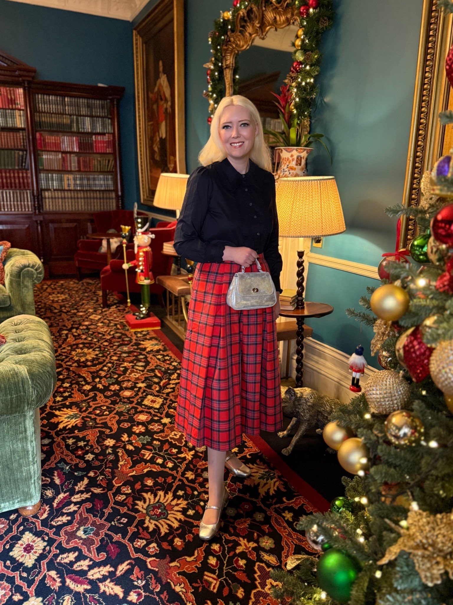 Tartan Tuesday! Separates really are the best thing to pack when travelling, hence why I have more Boden taffeta midi skirts than I can count! This is the new Verity red tartan taffeta midi which i partnered with a past Boden long sleeve navy cotton blouse (see the Hobbs blouse that’s very similar). Finishing touches are the silver Aloha flat Mary Janes & Tusting Mini Holly bag in silver. Ive also added many separates and accessories so you can mix and match your way into 2026!

#LTKwinter #LTKfestive #LTKeurope