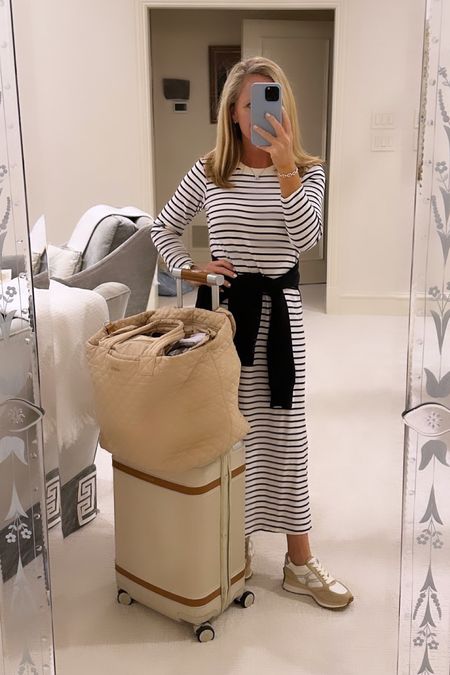 Favorite travel look 
Comfortable travel style 

Love this super soft striped tshirt dress from Tuckernuck. It’s my all time favorite travel look! 
Paired with Spanx AirEssentials half zip on black and Veronica beard sneakers. They run tts and are SUPER comfortable 
Best carry on suit case from Paravel and tote from MZ Wallace 


#LTKitbag #LTKstyletip #LTKtravel