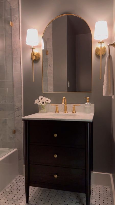 Moody classic bathroom remodel 🖤 Obsessed with our black small vanity with marble top - so gorgeous! And aged brass finishes throughout! The pluming fixtures are all Amazon and great!