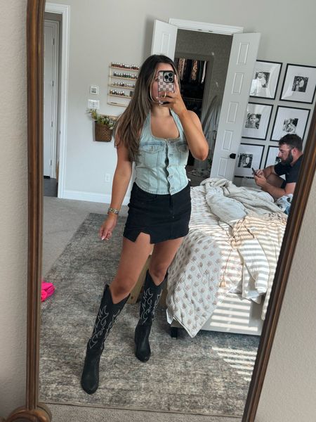 Country concert outfit, wearing a medium in the denim top, black denim skirt is from Amazon and sooooo stretchy and comfy, Amazon black cowboy style boots 

#LTKFestival