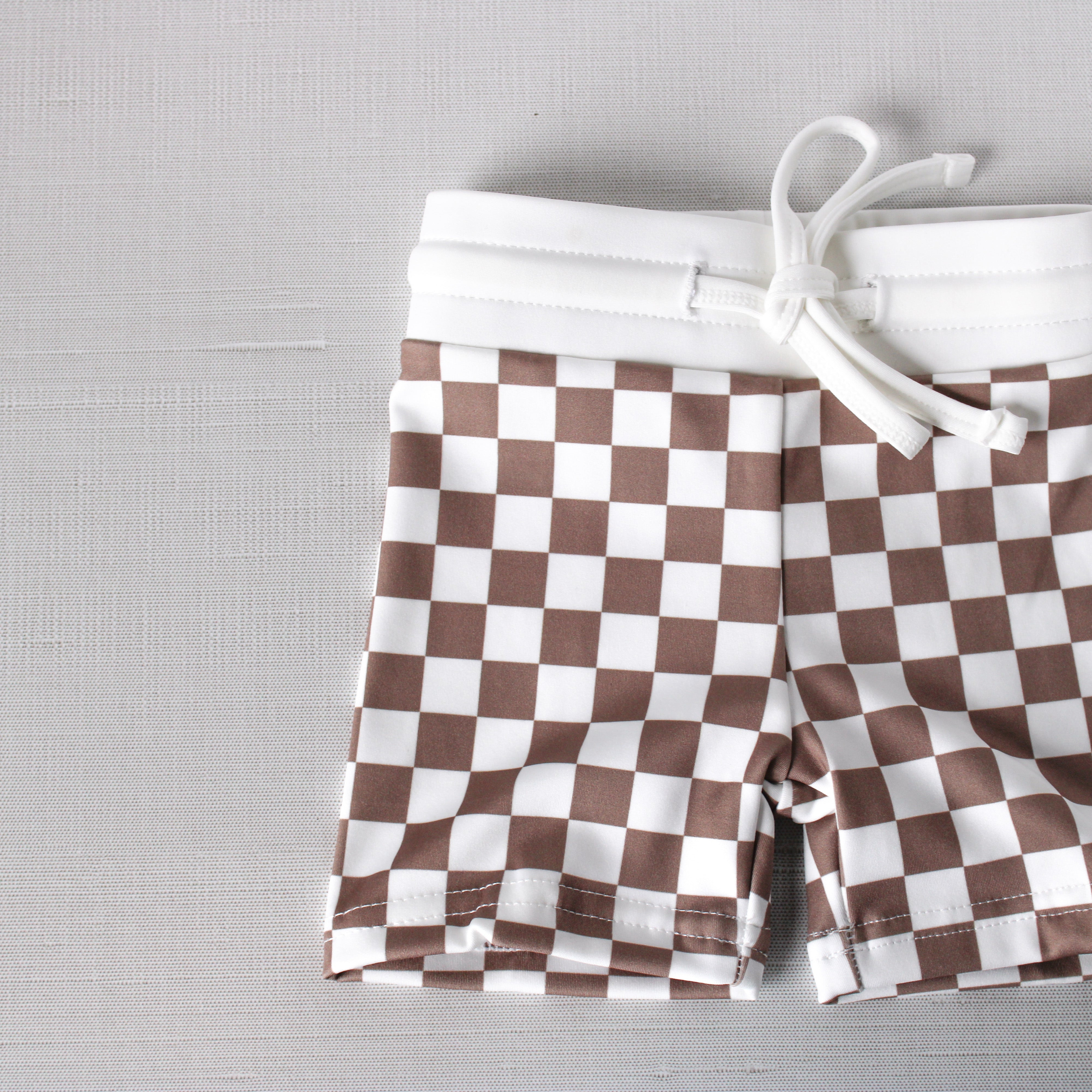 tan checkered swim shorts | Joss and J