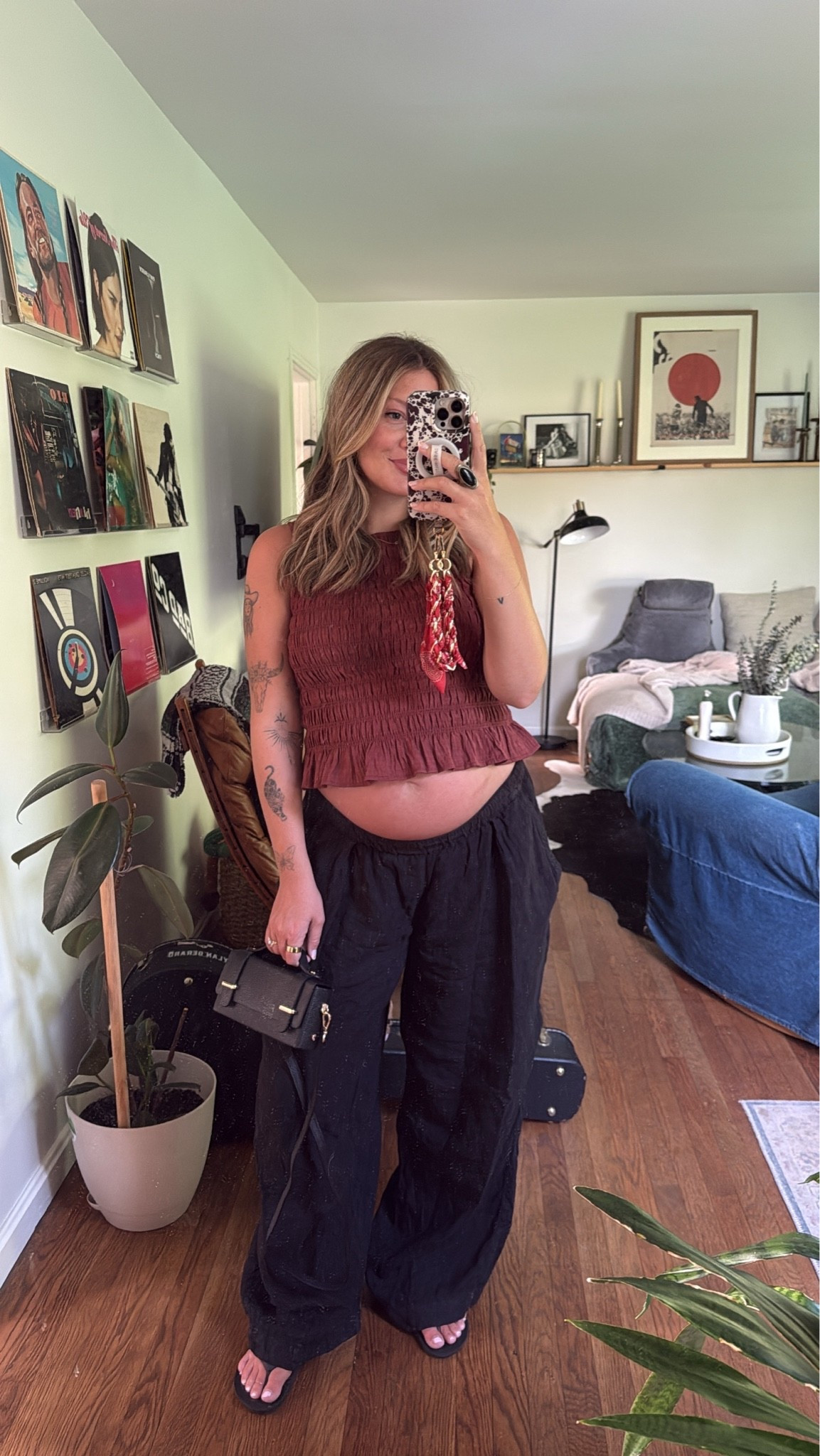31 weeks pregnant and these clothes fit differently than they did 3 weeks ago… featuring my new purse from Paris 🤩