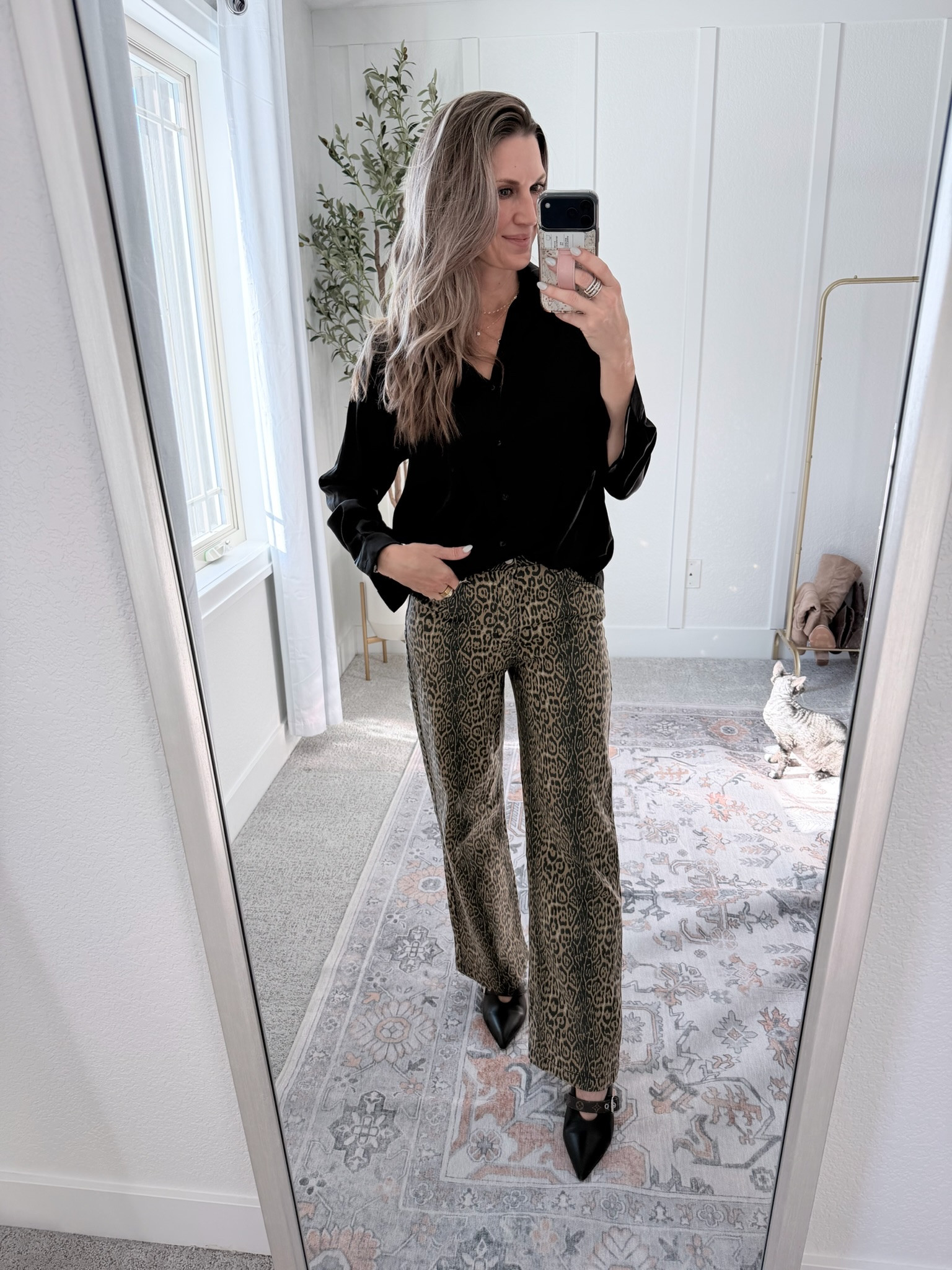 Effortlessly chic 🖤 A classic black button-up paired with statement leopard pants and sleek pointed-toe heels—polished, confident, and easy to dress up or down.

#LTKOver40 #LTKootd #LTKHoliday