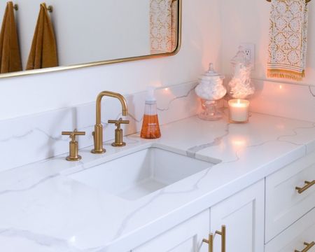 What are the Best Ways to Maximize Space In a White and Gold Modern Small Bathroom Remodel?

If you’re looking to remodel your small bathroom, modern white and gold may be the perfect color scheme for you. This classic color combo is both timeless and beautiful, and it can help make your bathroom look and feel more spacious. Here are a few more tips to help you make the most of your remodel.

Invest in multipurpose furniture such as a vanity that doubles as a universal storage cabinet. This type of furniture can help you make the most of your small bathroom space without compromising on style. Floating shelves are a great way to add storage and a styling area to a small bathroom without taking up any floor space. You can also hang baskets or shelves on the walls to maximize the amount of storage without sacrificing the look of your bathroom. A slim sink can save a lot of space in a small bathroom, and it will still look stylish and modern. Consider investing in a wall-mounted toilet, as this will help open up the space and make the bathroom feel larger. Investing in multipurpose furniture and utilizing wall space will help you make the most of your bathroom without sacrificing style.

#LTKhome #LTKsalealert