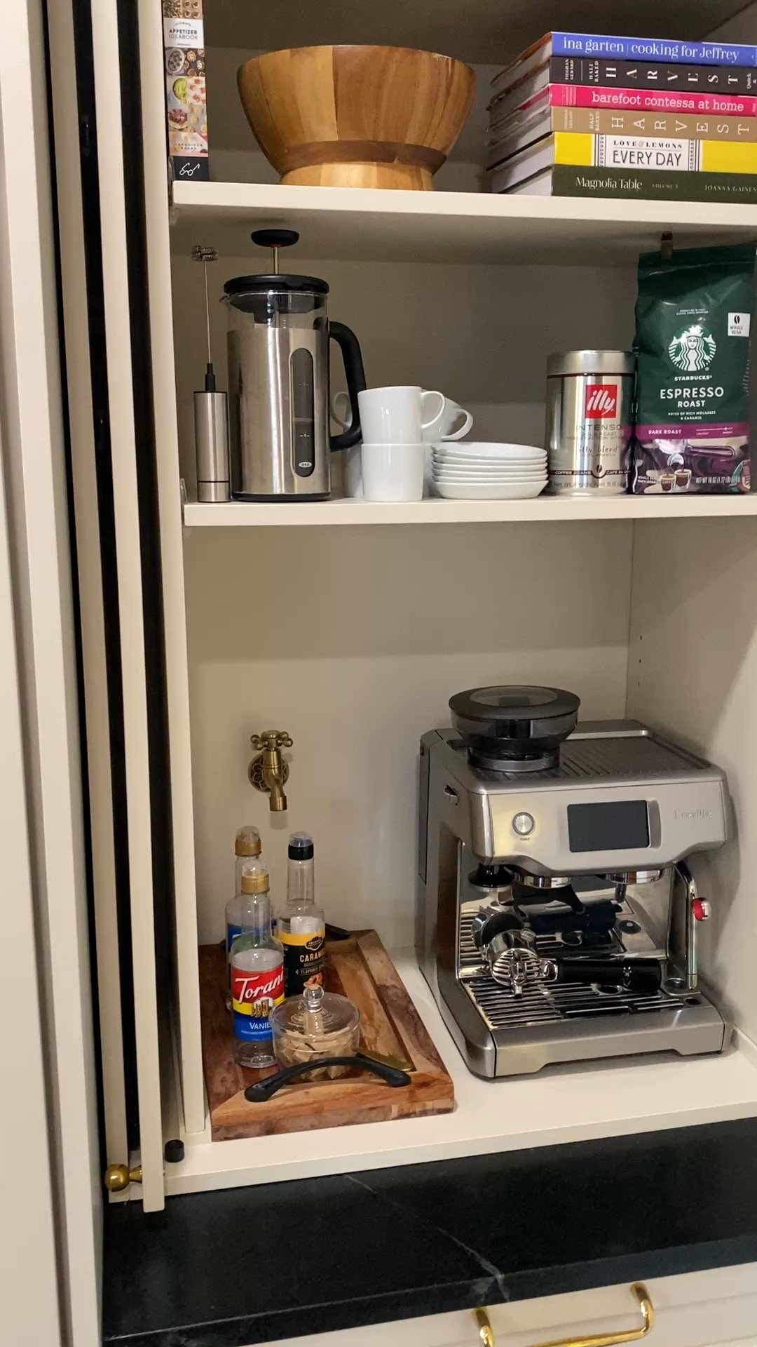 One thing that's always been at the top of my list? Creating a cabinet coffee station where I can keep everything conveniently in one spot! Here's how mine turned out!

#coffeestation #coffeebar #cabinetcoffeestation #cabinetcoffeebar #homecoffeestation #hiddencoffeestation #kitchencoffeestation #coffeestationideas #cabinetcoffeebarDIY 

 #LTKmorningroutine #LTKOver40 #LTKHome