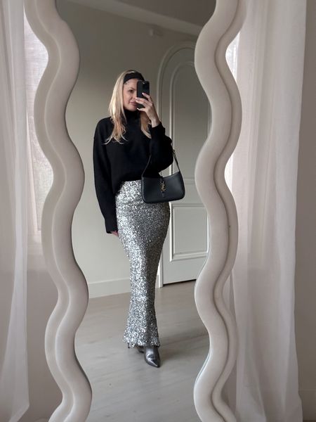 Boots are from Zara (old) linking similar ones below. Sweater wearing size XS and skirt size 2. The length is perfect! I’m 5’5” #holidayoutfit #skirt #maxiskirt #sequinskirt #sweater #sweaterstyle #silverboots 

#LTKSeasonal #LTKHoliday #LTKfindsunder50