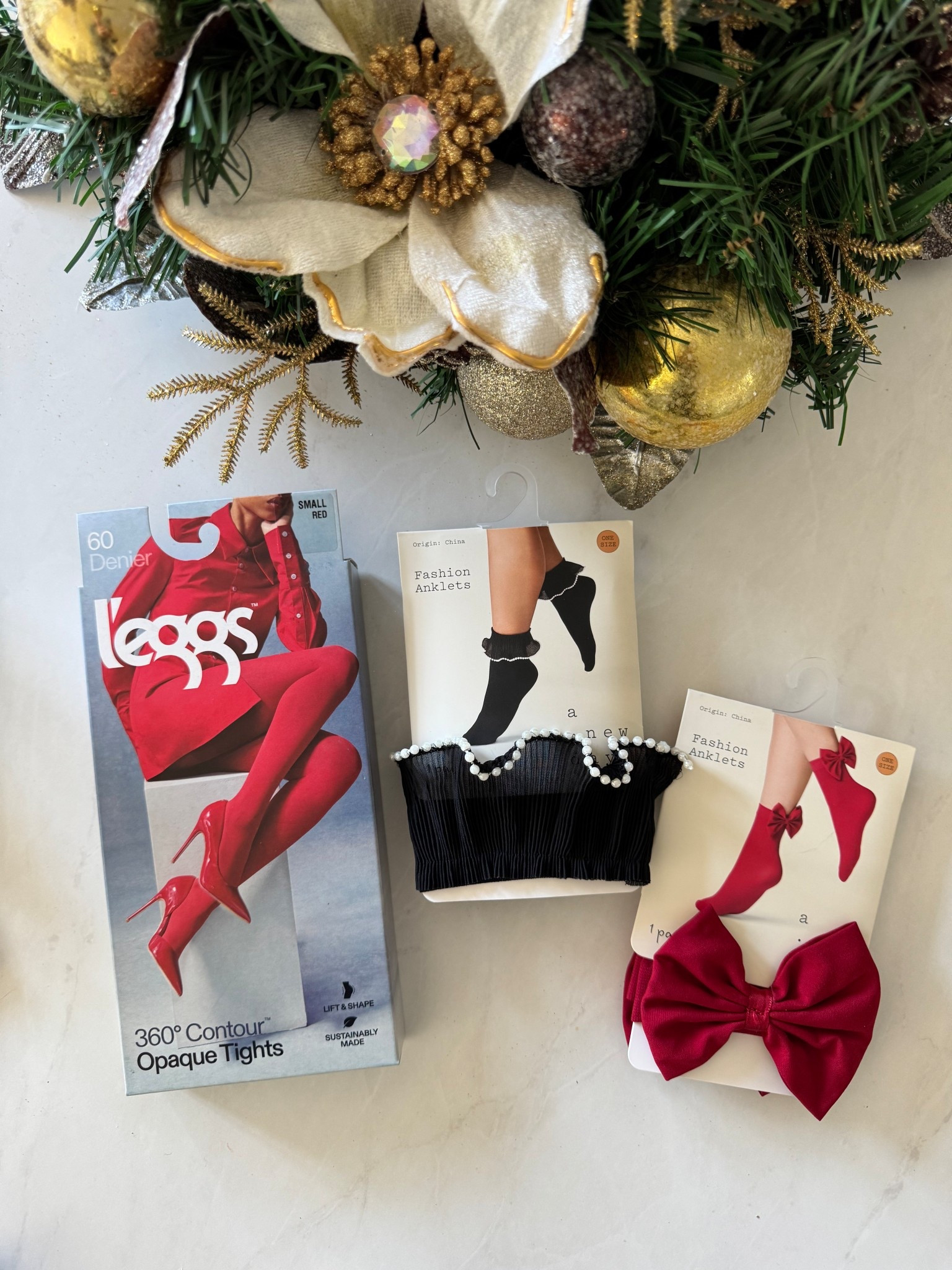 Red tights, red bow socks, black pearl ruffled socks, holiday accessories 

#LTKHoliday #LTKGiftGuide #LTKFindsUnder50