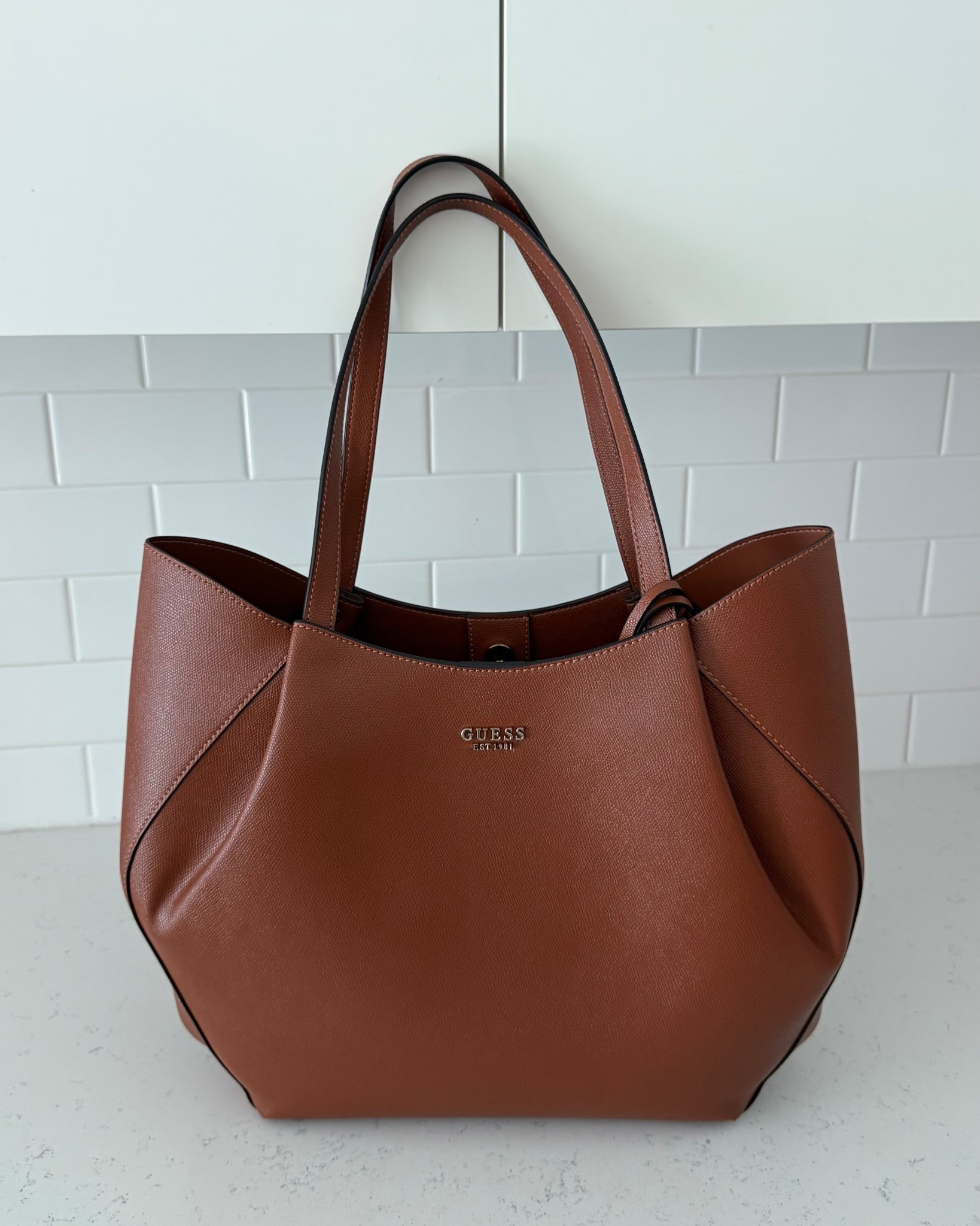 my new favorite tote bag🤎 #GUESSPartner @guess 

#LTKGiftGuide #LTKHoliday