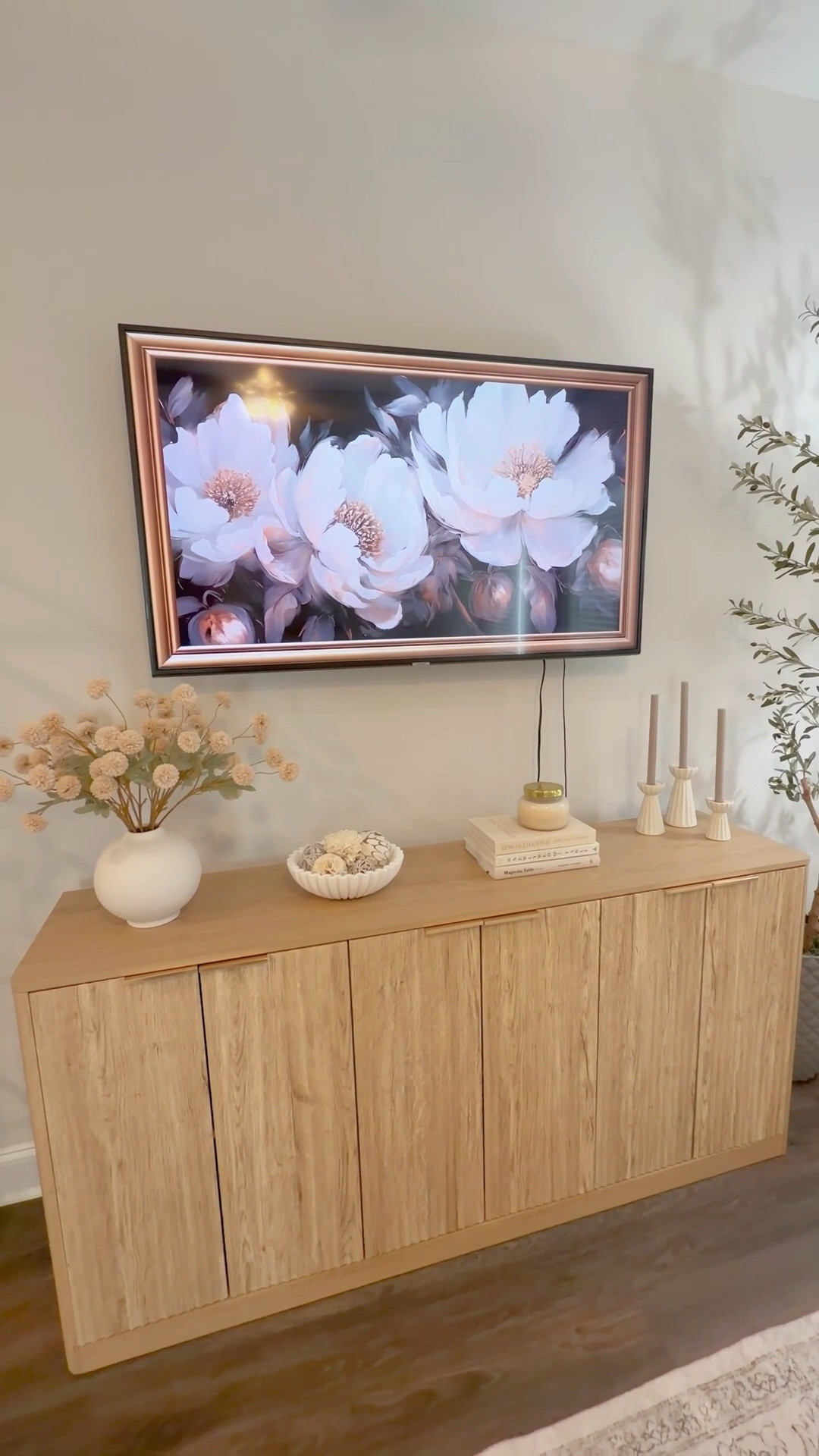 styling this console might be my favorite little moment in our living room 🤎

I wanted it to feel soft and cozy without looking cluttered, so I kept things simple:

• a stack of neutral books to anchor the space
• a small candle moment for warmth
• faux florals for a little texture and height
• a few neutral accents to keep everything feeling balanced

and the best part? this whole console doubles as hidden toy storage inside… because pretty decor that still works for real life will always be the goal around here.

saving this little console styling formula for my next refresh too ✨

✨ Comment “LINKS” and I’ll send everything over (Make sure you’re following me to receive them)
✨ SHARE with a friend who’s in her cozy era
✨ SAVE for your own future refresh
✨ FOLLOW for more affordable home finds & mom-friendly home styling

#consolestyling #livingroomdecor #neutralhome #cozyhome #affordabledecor #neutraldecor #homeinspo #cozylivingroom #ltkhome

#LTKdayinmylife #LTKHome #LTKmomlife