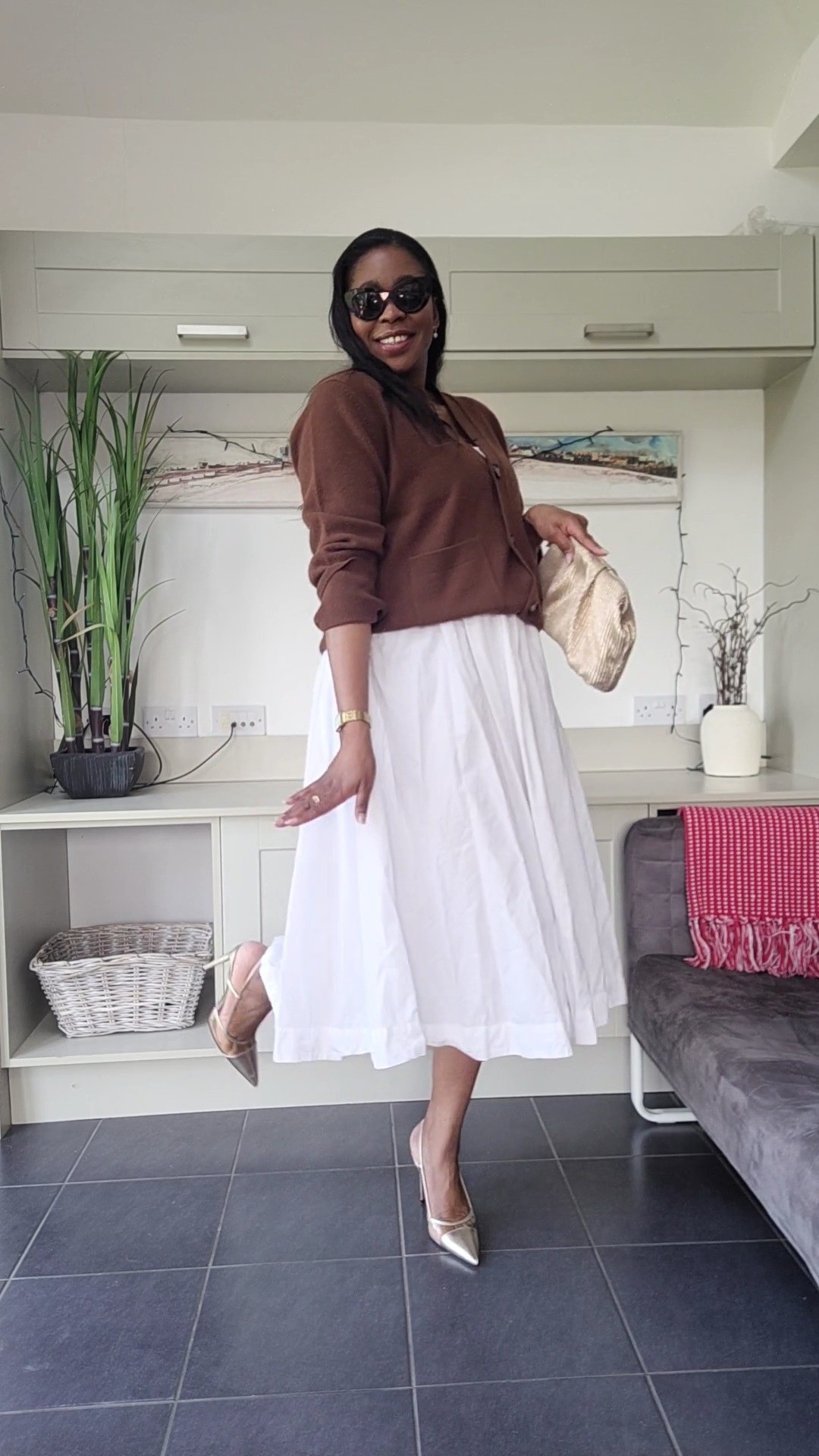 Spring Outfit: brown cardigan and white midi skort/dress, with gold accessories.#ltkuk #ltkspringsale #ltkover40 

#LTKmodest #LTKspring #LTKsale