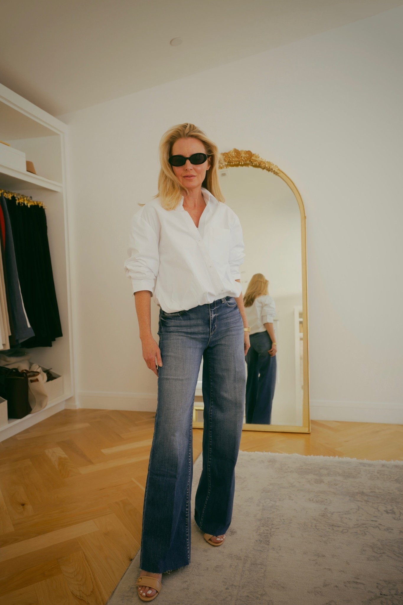 This white button down became an instant favorite for me. It’s so flattering, the criss-cross effect in the front feels very modern, and the bubble hem means no fussing with how to tuck it or wear it. TTS. 🙌🏻 🤍

#LTKOver40 #LTKSeasonal