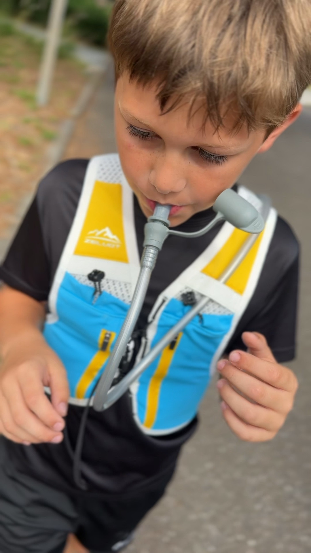 kids running vest with water canteen
