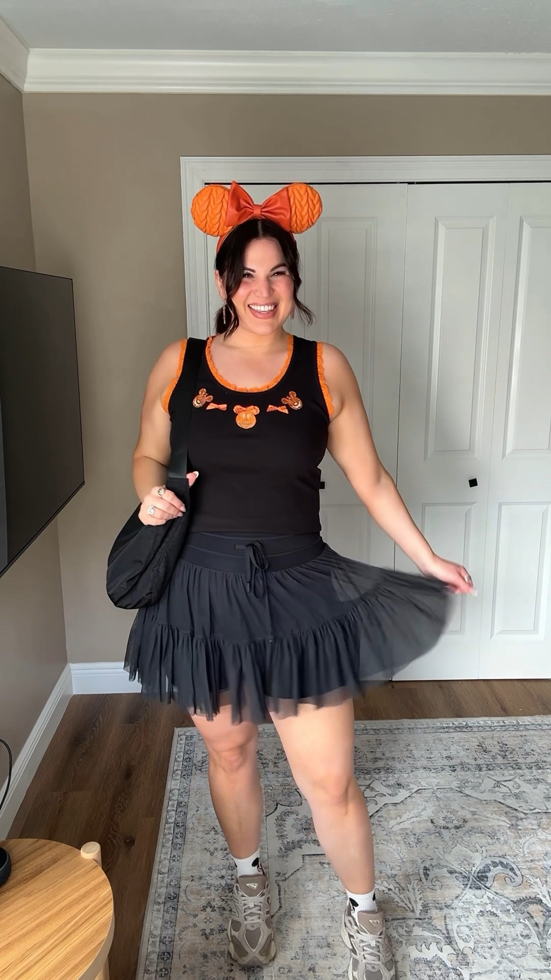 Midsize Halloween disney outfit 🎃 sharing another outfit I wore to the disney parks last weekend! This one I wore to Epcot + I got soo many compliments throughout the day on this look 🥺 this top is sadly sold out online 😭 But I saw it at a couple different stores on Disney property - if you are looking for something to wear while there! 

Pajamas - top/bottoms : large 
Skort - xl
Tank - xl 
Sneakers - 9.5 



#LTKTravel #LTKMidsize #LTKHalloween