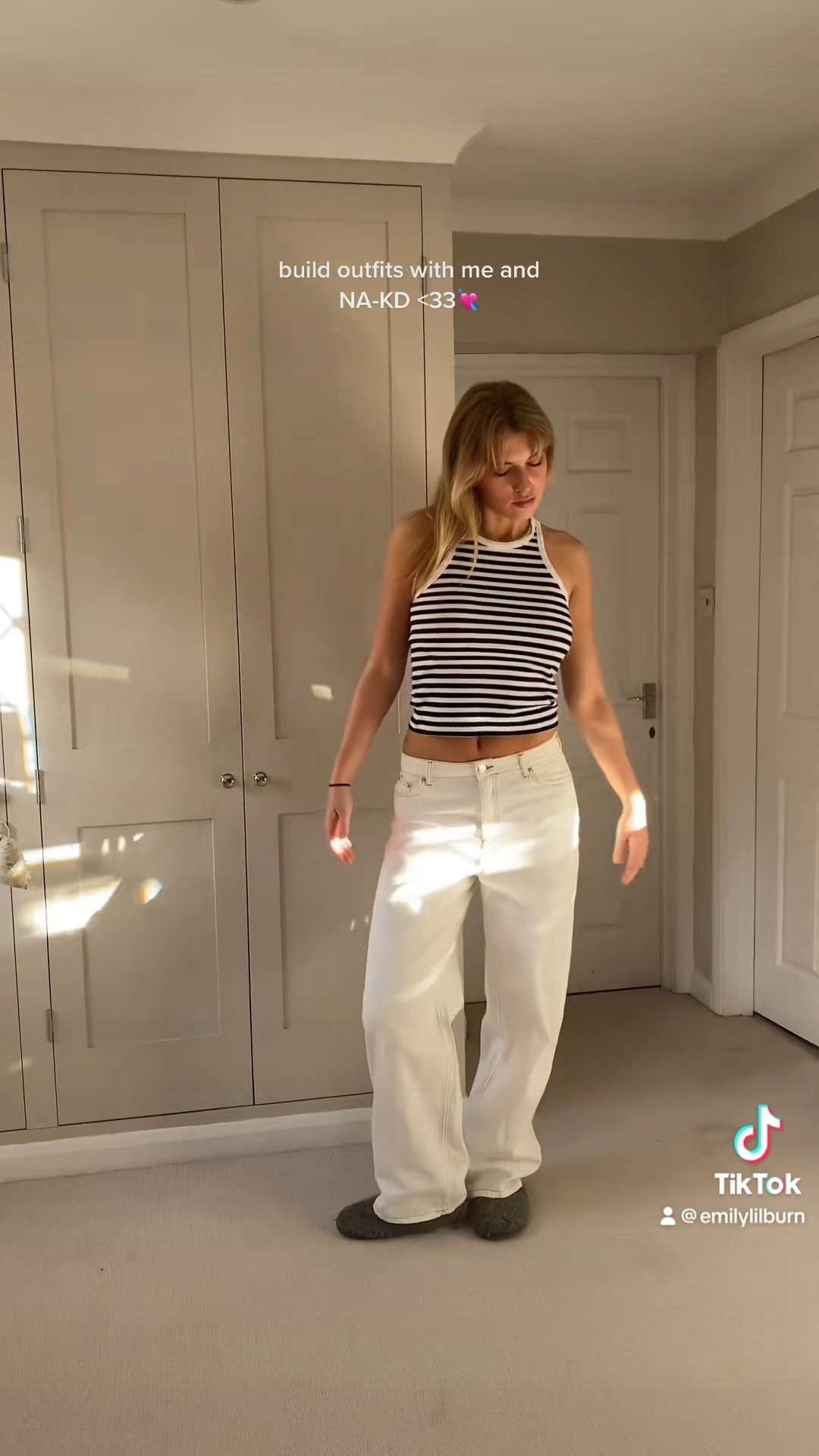 Summer wardrobe essentials, basics, white wide leg low rise jeans, striped vest top,  one shoulder top, cream shrug, knitted sleeves

#LTKstyletip #LTKeurope #LTKSeasonal