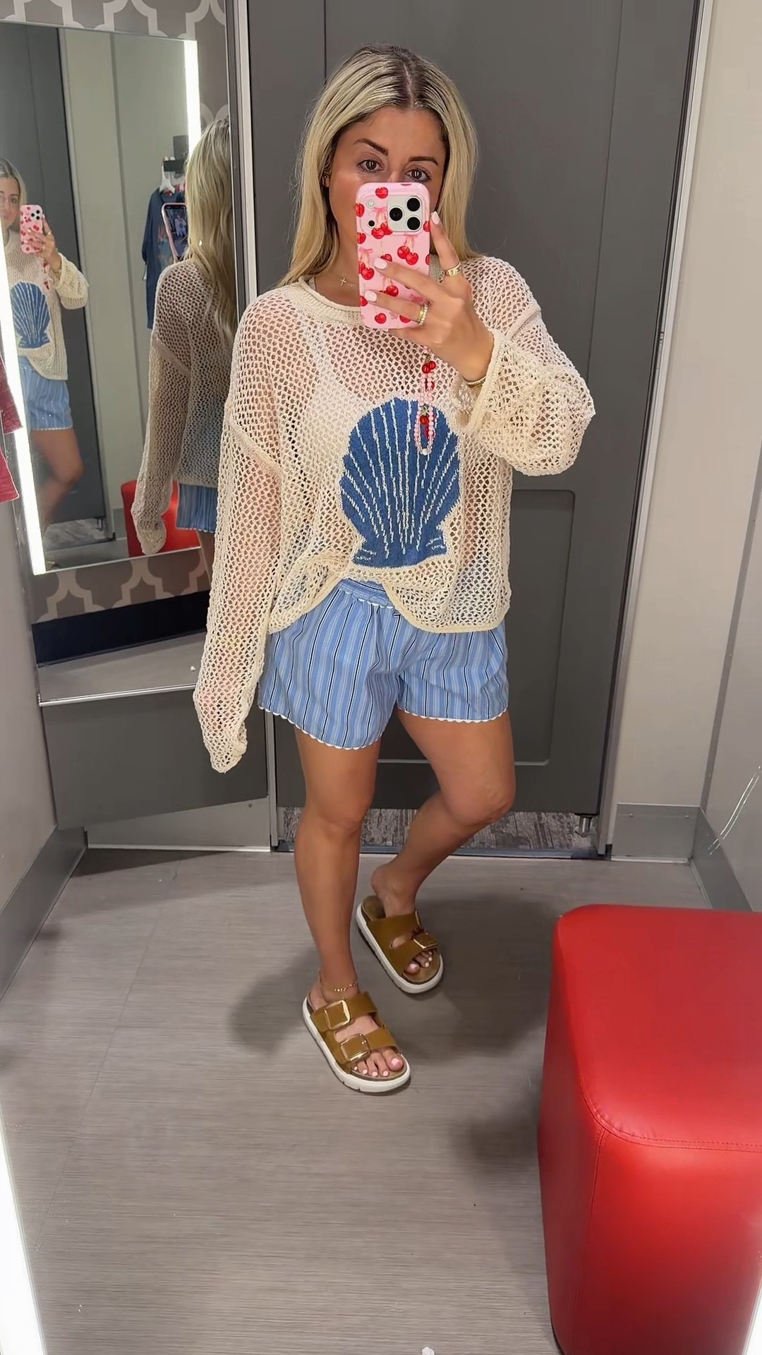 @Target outfit idea 🐚
Large shell sweater
Small shorts 
Sandals tts