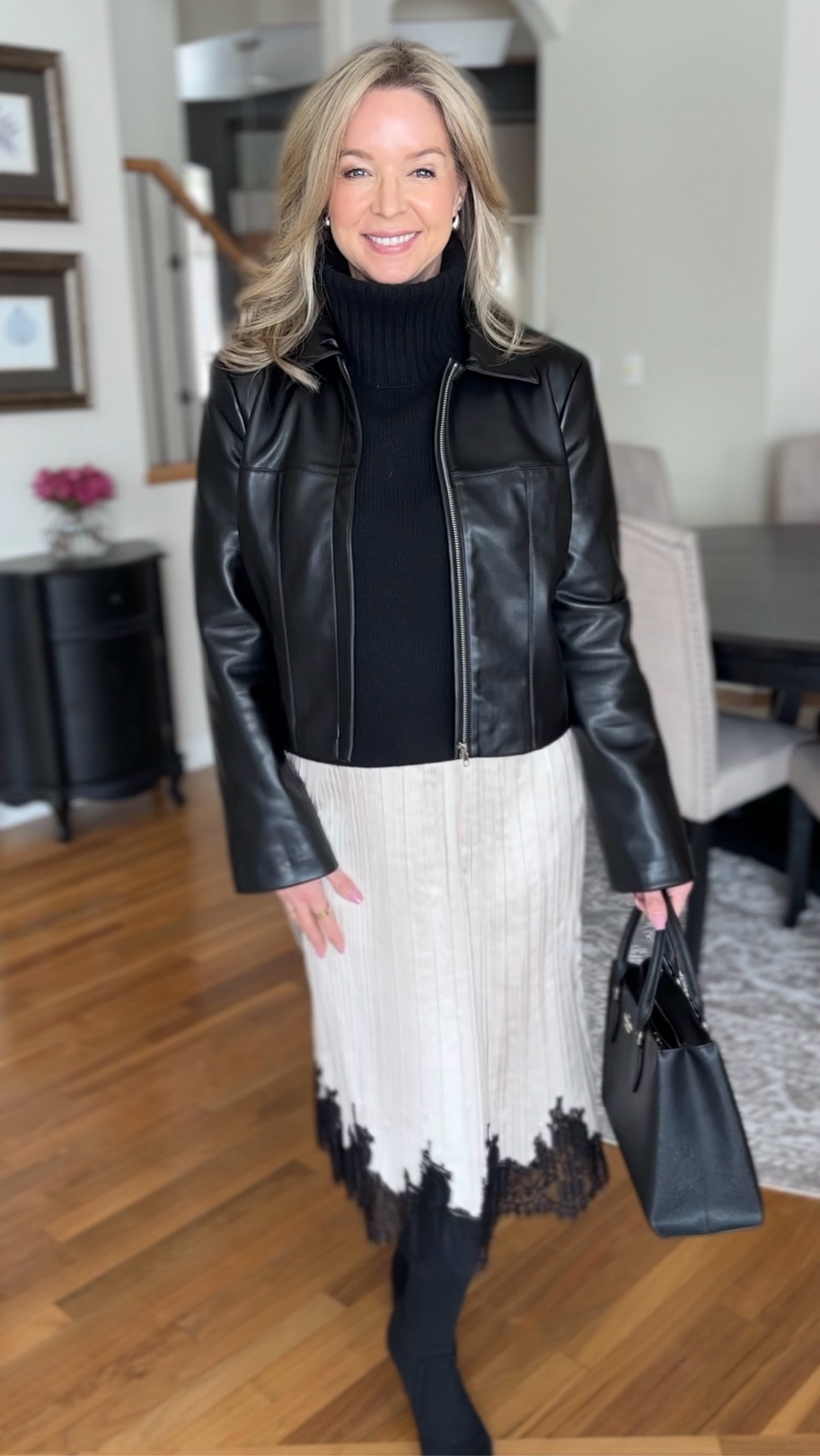 Faux leather jacket This blazer is made from soft, structured faux leather. It's designed for a fitted silhouette that's slightly cropped for a clean, sleek look. Wearing size M Comes in black or brown

Paired with a creamy satin skirt with a lace hem, it adds a bit of femininity and contrast to the jackett

#LTKPetite #LTKgrwm #LTKOver40