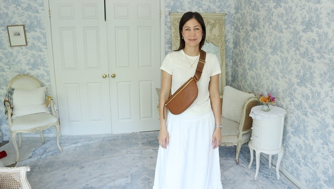 Today I’m sharing a simple all-white spring look I’ve been enjoying for errands and everyday outings. I’m wearing the Quince Organic Cotton Gauze Maxi Skirt with a soft Marine Layer Pointelle Tee, and finishing the look with my Quince Italian Pebbled Leather Sling Bag.

I love how effortless this combination feels. The gauze skirt is light and breathable, the pointelle tee adds a feminine texture, and the sling bag is both beautiful and practical it can be worn over the shoulder or as a belt bag, which I find so useful on busy days.

There is something so calming about an all-white palette. It feels fresh, simple, and quietly elegant.
Do you enjoy wearing monochrome outfits in spring?

Keep calm and remain classy.

#tenitemwardrobe #dailyconnoisseur #quince #marinelayer #springstyle #minimalstyle #effortlessstyle

#LTKdayinmylife #LTKSeasonal #LTKWorkwear