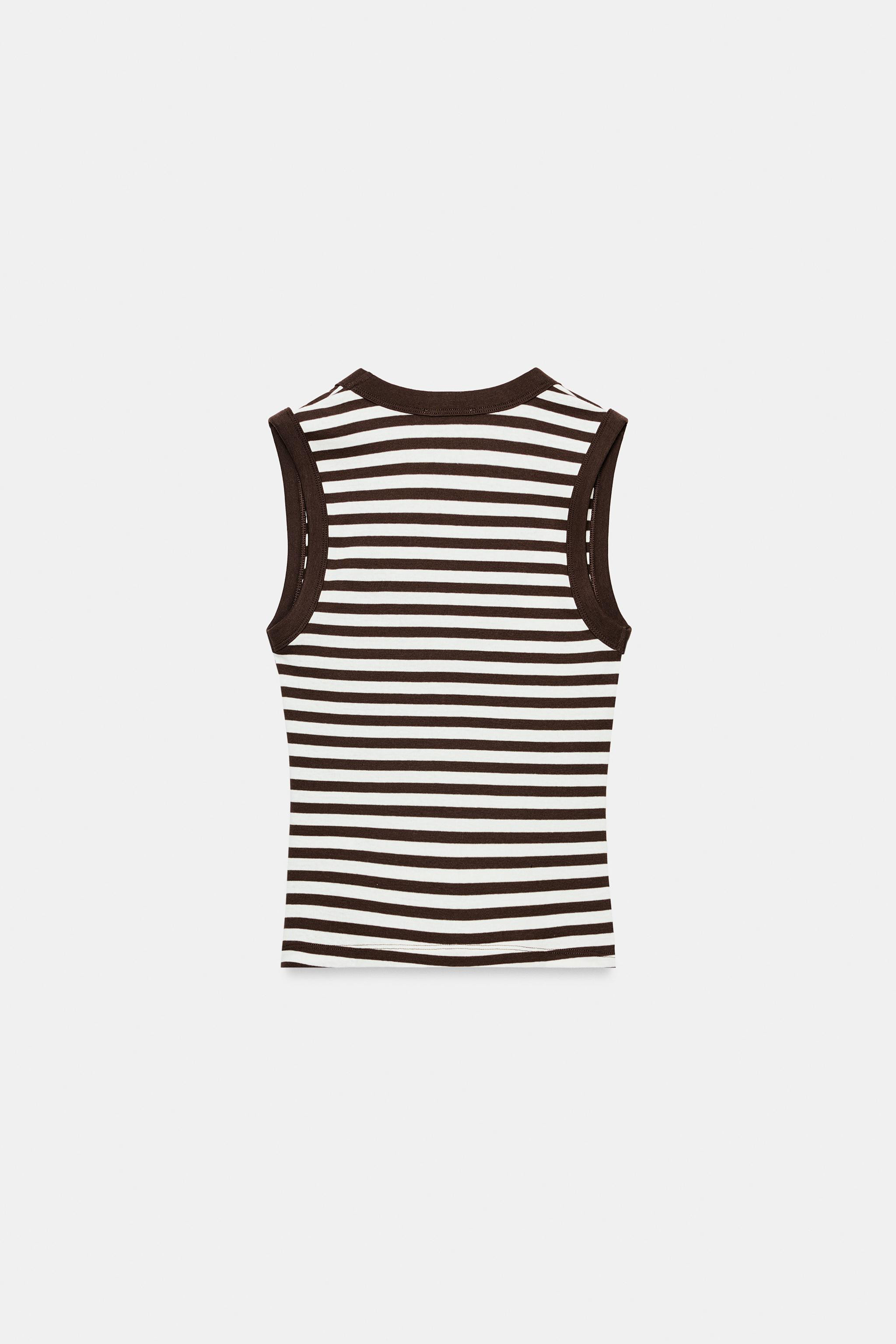 SLIM FIT - V-NECK - REGULAR LENGTH - SLEEVELESSTank top made from 100% cotton yarn. V-neck and sl... | Zara US