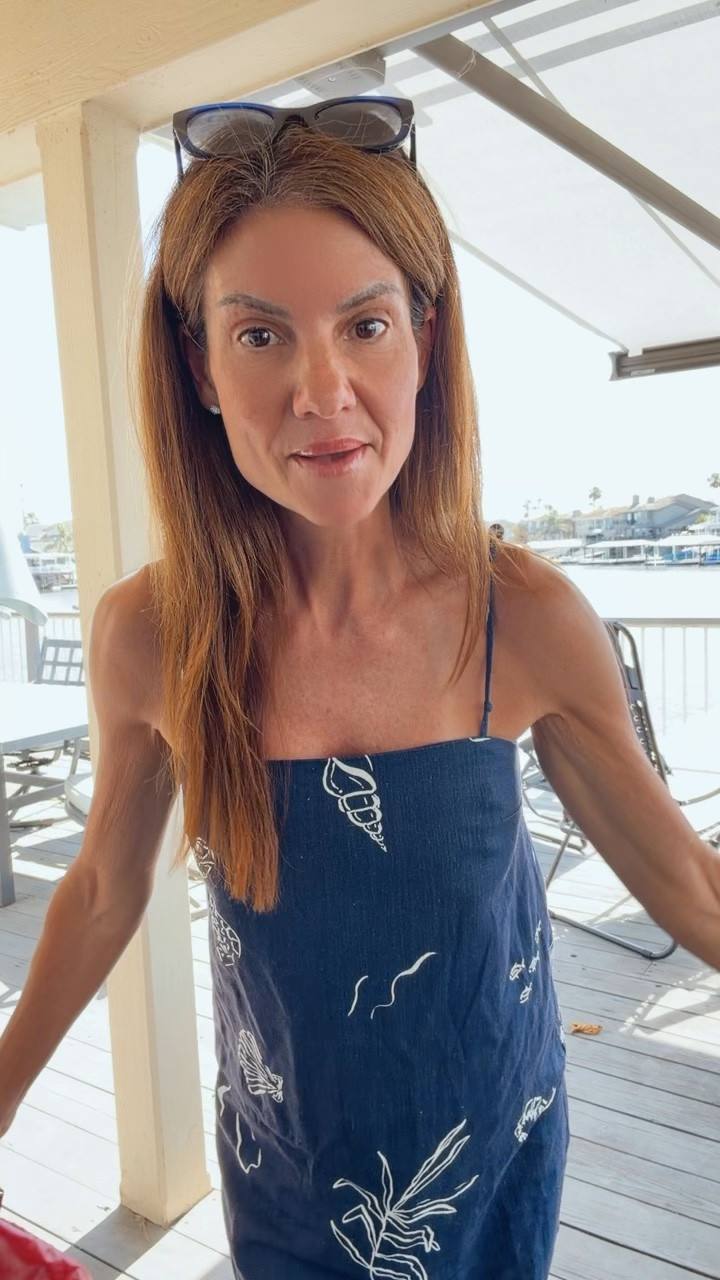 @Capital Z is having a 25% off sale site wide. Love this red bag. The leather is so soft and all the compartments keep me very organized. This could be a great graduation gift. I'm wearing a navy dress with white detail, sunglasses amd flip flops.

#LTKootd #LTKSaleAlert #LTKOver40