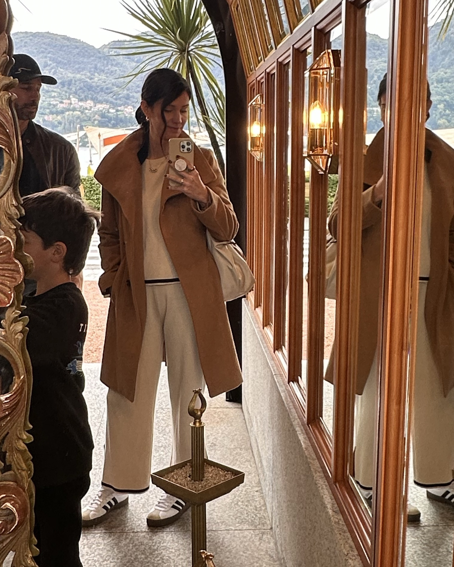 Wearing a small in the loungewear set. It was perfect for travel. A small in the coat. This bag has been my go to for carrying ALL THE THINGS. I tied a silk scarf on it to change it up a bit. And these shoes has been clutch this trip. TTS and on sale  

#LTKTravel #LTKFindsUnder50 #LTKSaleAlert