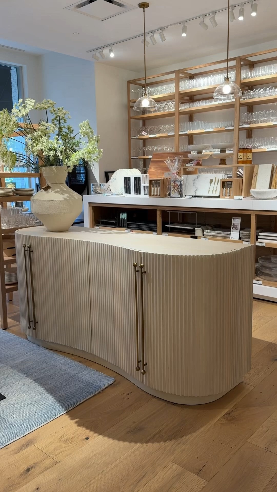 Luxury storage with a sculptural twist! 💫 The Coastline Credenza by Brigette Romanek for Crate & Barrel features gorgeous curved lines, fluted oak detailing, and burnished brass pulls that make it feel like a true designer statement piece. 🤍 The light whitewashed oak finish keeps the look warm and airy while the spacious interior offers plenty of hidden storage. Such a beautiful credenza for a dining room, living room, or entryway. Linked this piece and more statement sideboards! ✨ 
#CrateAndBarrel #sideboard #credenza

#LTKHome #LTKSaleAlert