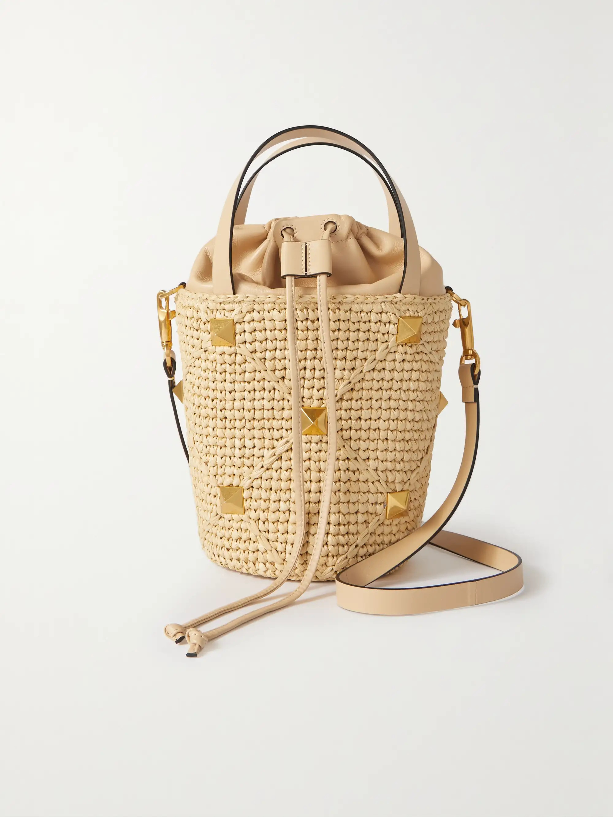 Valentino Garavani Roman Stud raffia and leather bucket bag | NET-A-PORTER (UK & EU)
