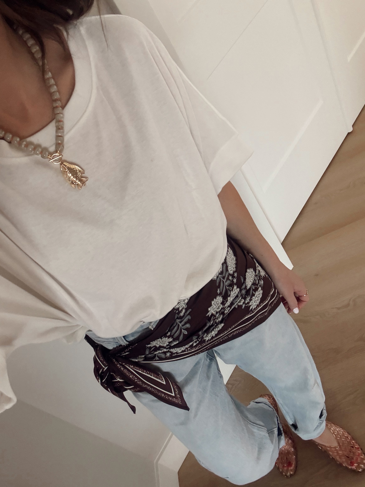 Weekend outfit details ✨ the best Amazon tee, my favorite cinch waist jeans, a hip scarf and jelly’s. My necklace is currently on sale 

Ootd, spring style, hip scarf, jelly flats, outfit idea, statement necklace