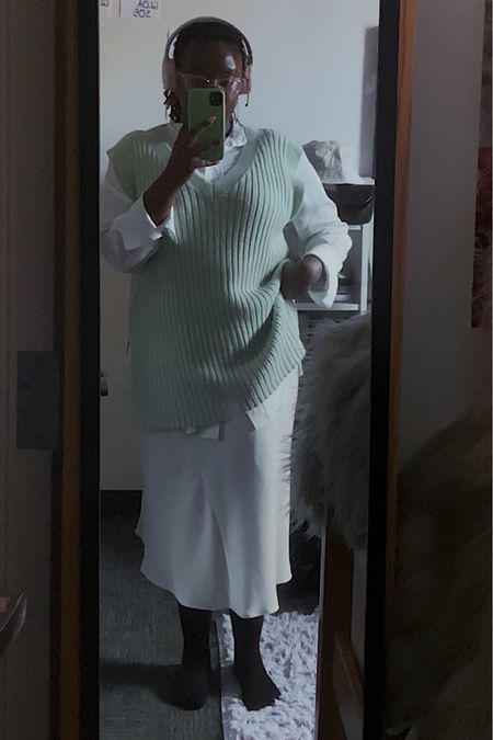Cozy Monday look featuring a white slip skirt from Target, a white satin button-down top from H&M, and a light green oversized sweater vest from H&M 

#LTKU #LTKunder50 #LTKSeasonal