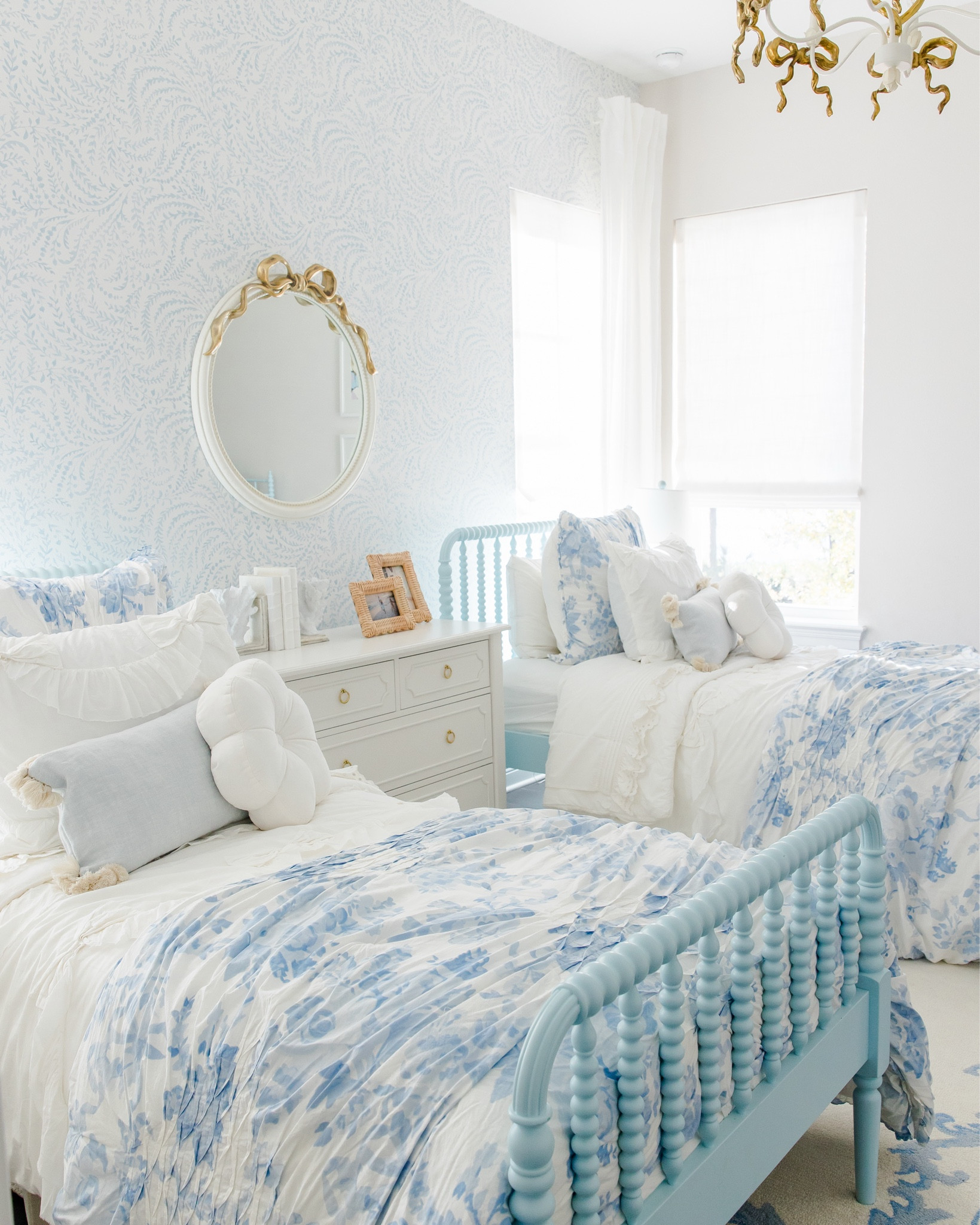 This blue bedroom went through a couple bedding refreshed but the colors and theme remained the same. I actually sprayed white spindle beds blue for more of a color pop. 

#LTKmomlife #LTKHome #LTKKids