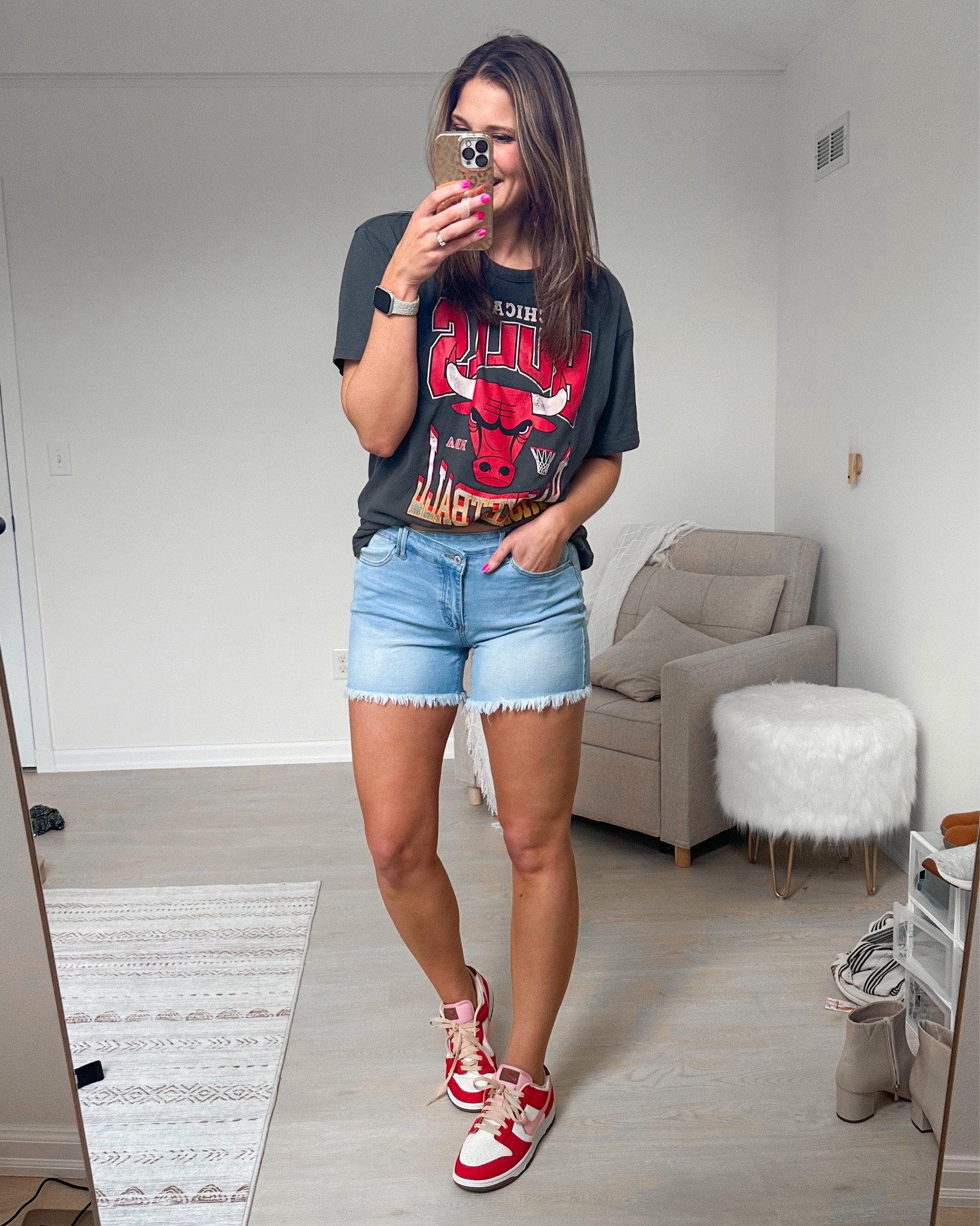 Chicago bulls tee with mid length jean shorts and pink and red Nike dunks 

#LTKMostLoved #LTKfindsunder50 #LTKSeasonal