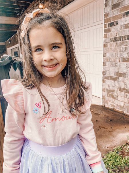 Janie and Jack is having their 60% off sale and this sweatshirt is darling. Now I wouldn’t tuck it in if I was styling it but I’m not four so you do you boo. It’s so sweet. And the ruffle sleeve with rainbow cuffs. You’re gonna need it too  

#LTKkids #LTKstyletip #LTKGiftGuide
