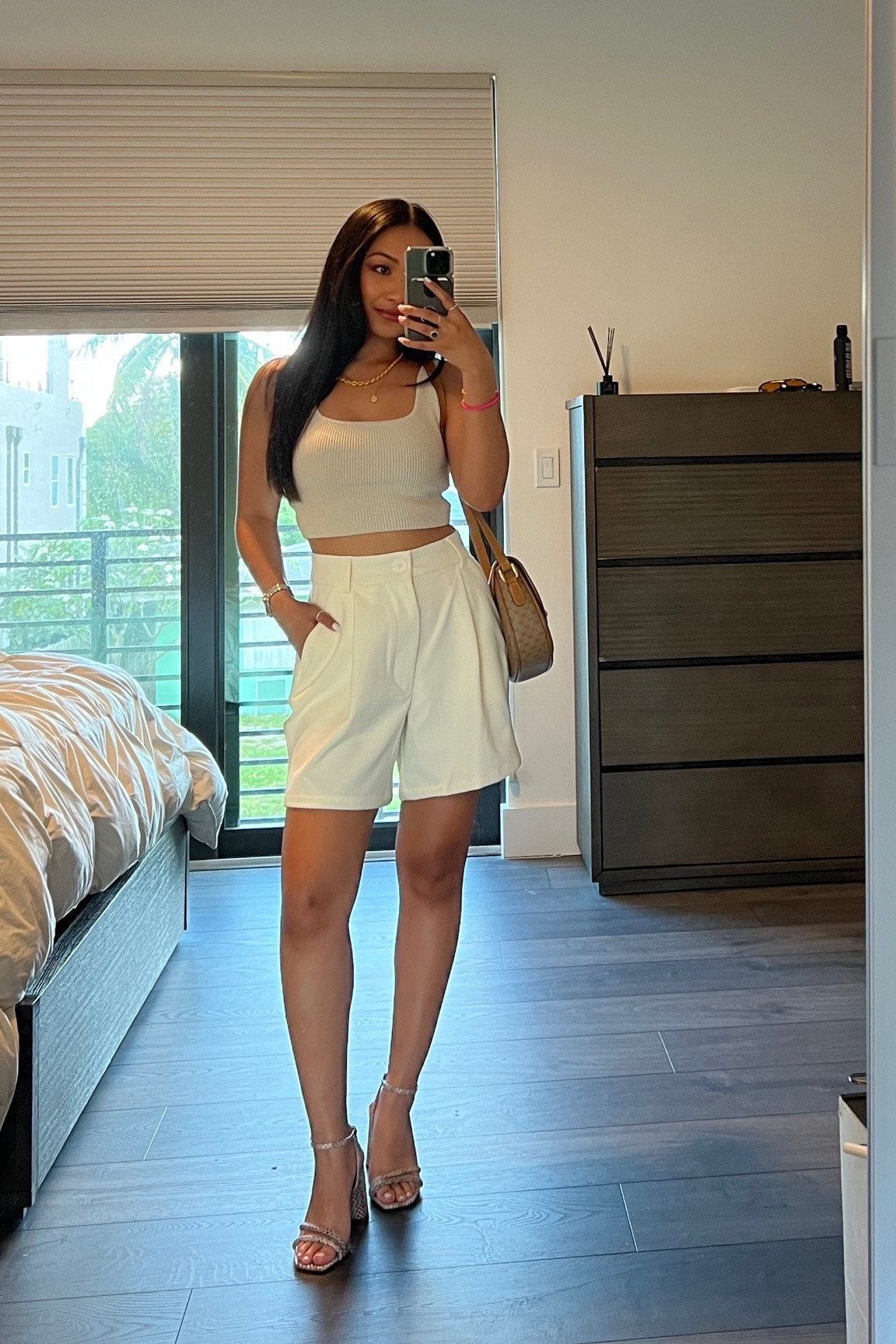 brunch summer outfit | weworewhat white trouser shorts, aritzia babaton cropped tank (linked similar), sam edelman kia heels (size 6), vintage gucci bag 

#LTKstyletip #LTKshoecrush #LTKfindsunder100