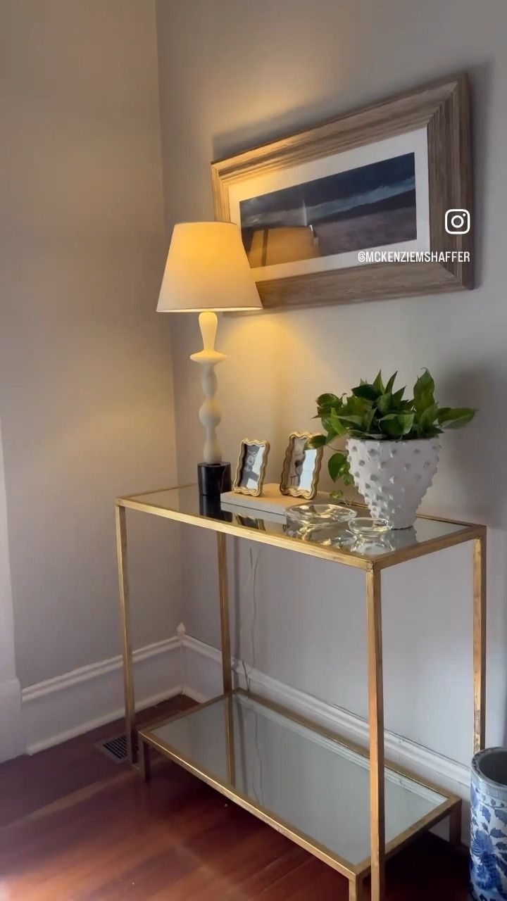 my entry table refresh 🌿 | crystal yin & yang dishes are 20% off | photo frames from Homegoods but linked similar ones |  home decor | foyer inspiration | spring refresh | home styling | interior decor 

#LTKSale #LTKFind #LTKhome