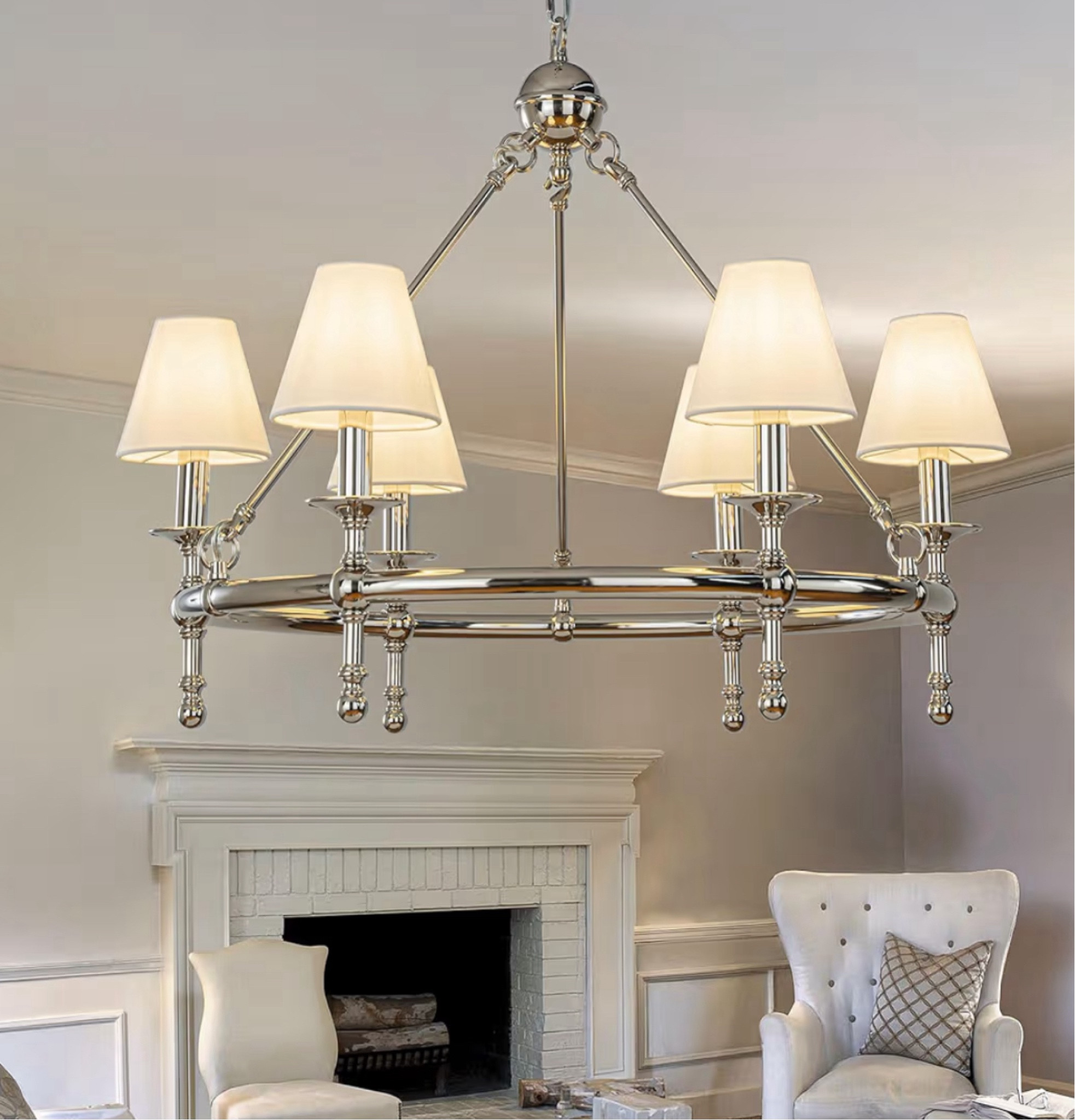 Bring timeless elegance and mid-century modern style to your home with the LTK 6-Light Chandelier. Featuring a sophisticated polished nickel finish and a beautifully crafted white pleated fabric shade, this large round chandelier creates a warm, inviting ambiance while serving as a striking focal point in any room.
Key Features
Elegant Design: Combines classic refinement with mid-century modern aesthetics.
6-Light Configuration: Provides ample illumination for dining rooms, living rooms, foyers, and other gathering spaces.
Large 34-Inch Diameter: Makes a bold statement while offering balanced light distribution.
Premium Finish: Polished nickel frame adds a sleek, contemporary touch and lasting durability.
White Pleated Fabric Shade: Softens the light for a comfortable, sophisticated glow.
Versatile Placement: Ideal for dining rooms, living rooms, entryways, and other classic or transitional interiors.
Perfect For
Dining rooms
Living rooms
Entryways and foyers
Mid-century modern interiors
Classic and transitional home décor