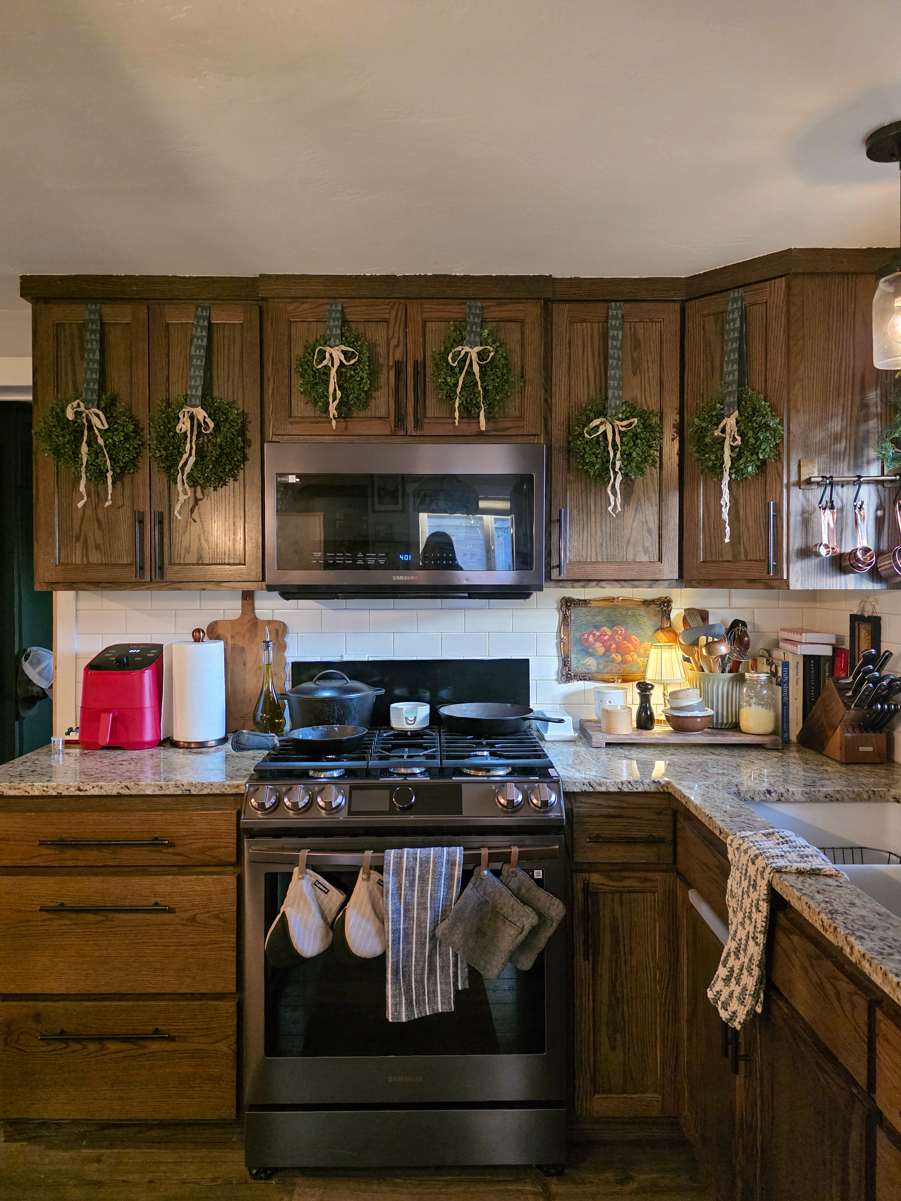 Give me all the cozy vibes in the kitchen this season. The mini wreaths on the kitchen cabinet doors are my favorite #kitchen  

 #LTKHoliday #LTKSeasonal #LTKHome