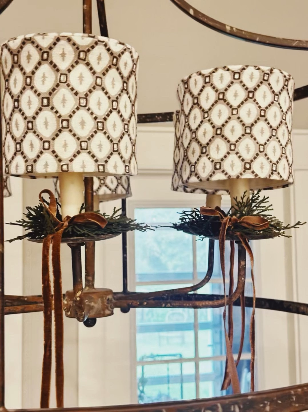 I bought these cute faux cedar napkin rings last year and never used them.

I had the idea to use them this year on my sitting area light fixture.

I tied a narrow velvet ribbon on each one and slipped it over each light on the chandelier. 

It is such a cute simple addition to holiday decor.

The same idea would be so cute for napkin rings for a holiday table. 


#wreaths #christmasdecor 
#holidaydecorating 
 

#LTKVideo #LTKHoliday #LTKHome